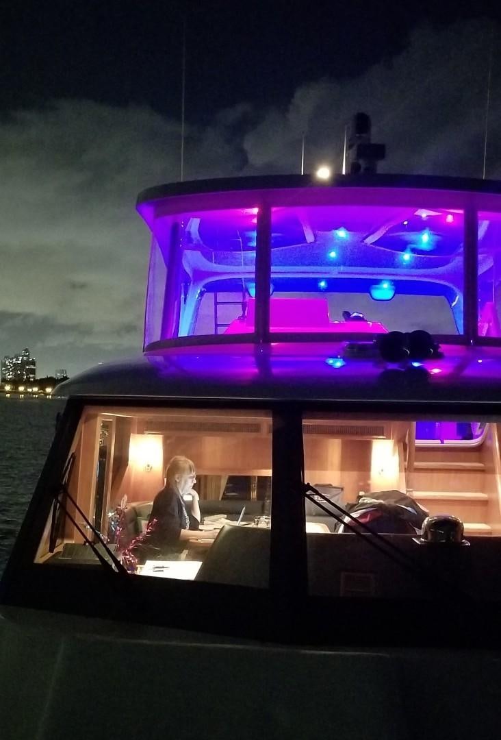 a purple and blue television set aboard TJ SQUARED Yacht for Sale
