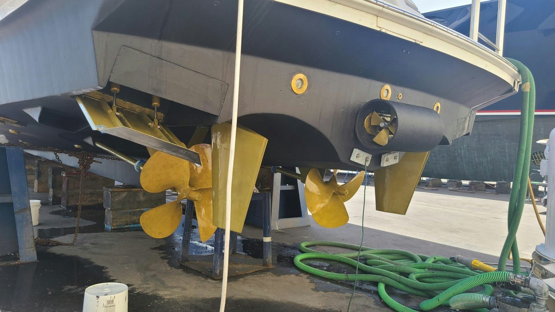 a large airplane with a green and yellow propeller aboard TJ SQUARED Yacht for Sale