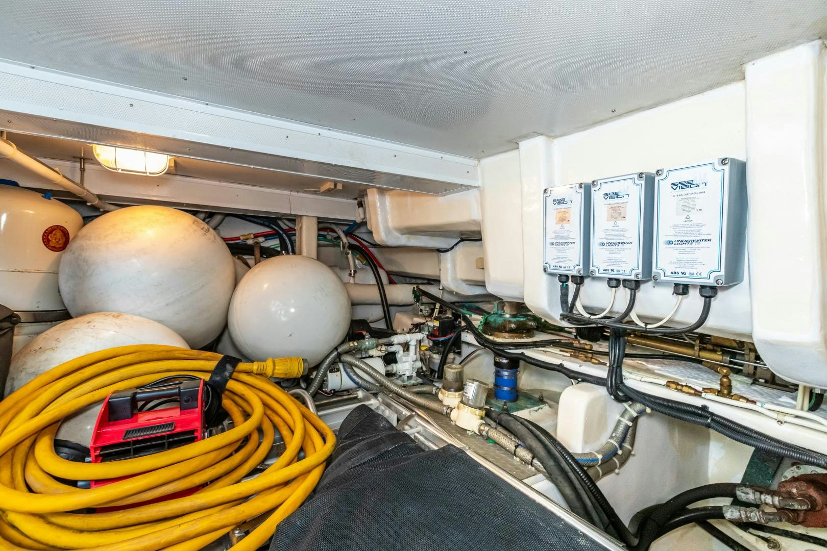 a machine with a large white object on the side aboard TJ SQUARED Yacht for Sale