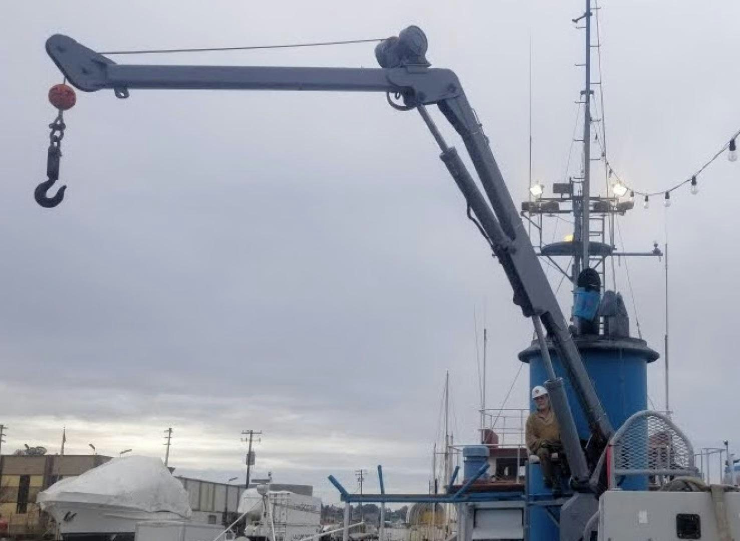 a person on a large machine aboard SACAJAWEA Yacht for Sale