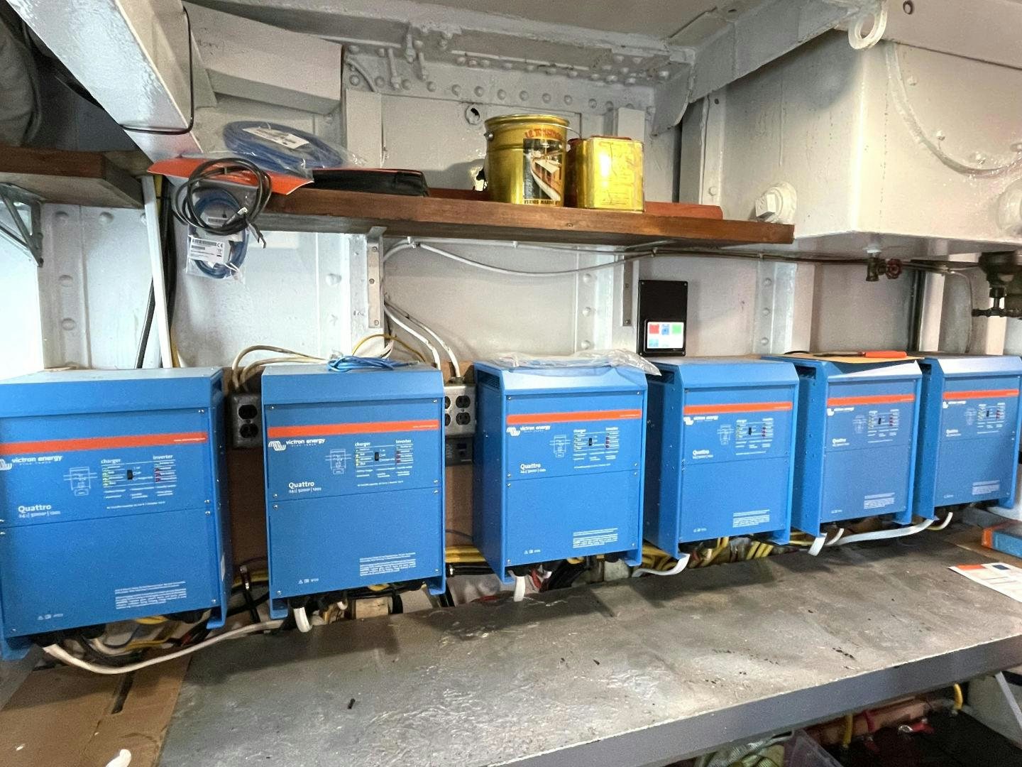 a large factory with blue containers aboard SACAJAWEA Yacht for Sale