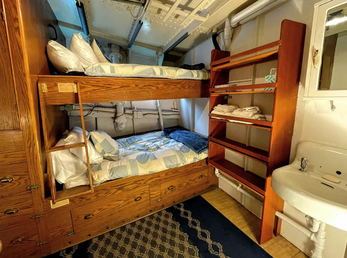 a bunk bed in a room aboard SACAJAWEA Yacht for Sale