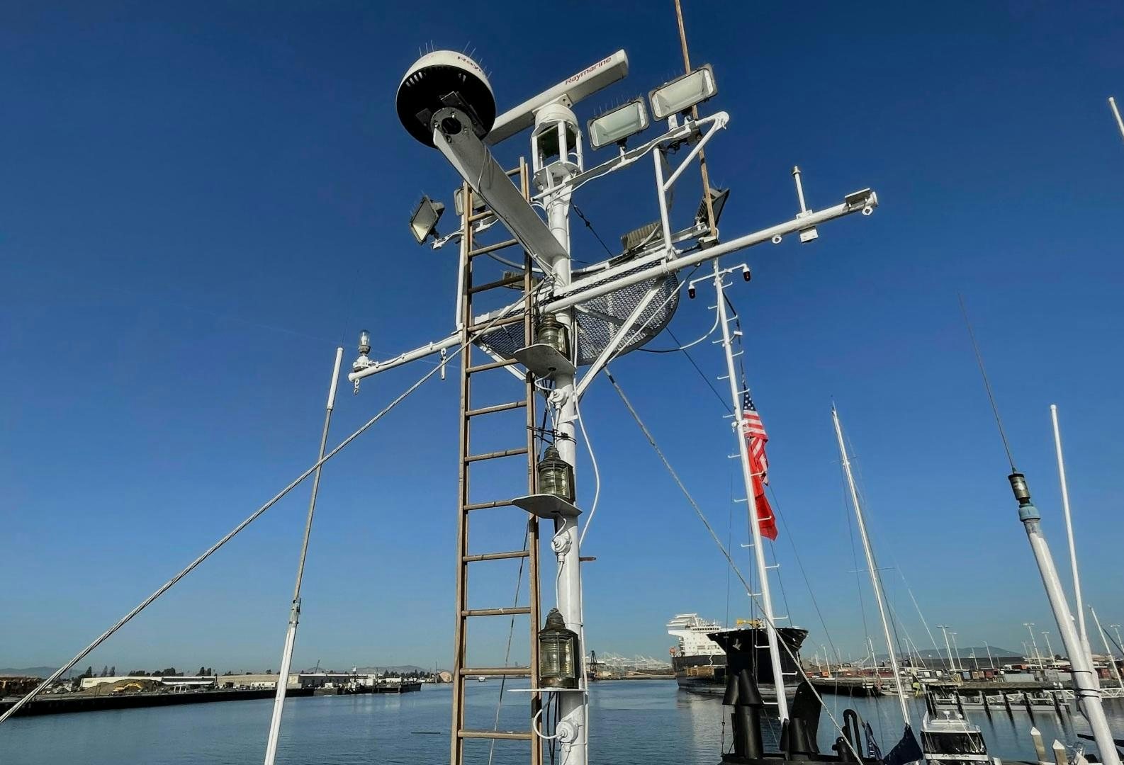 a large metal tower with a satellite dish on top aboard SACAJAWEA Yacht for Sale