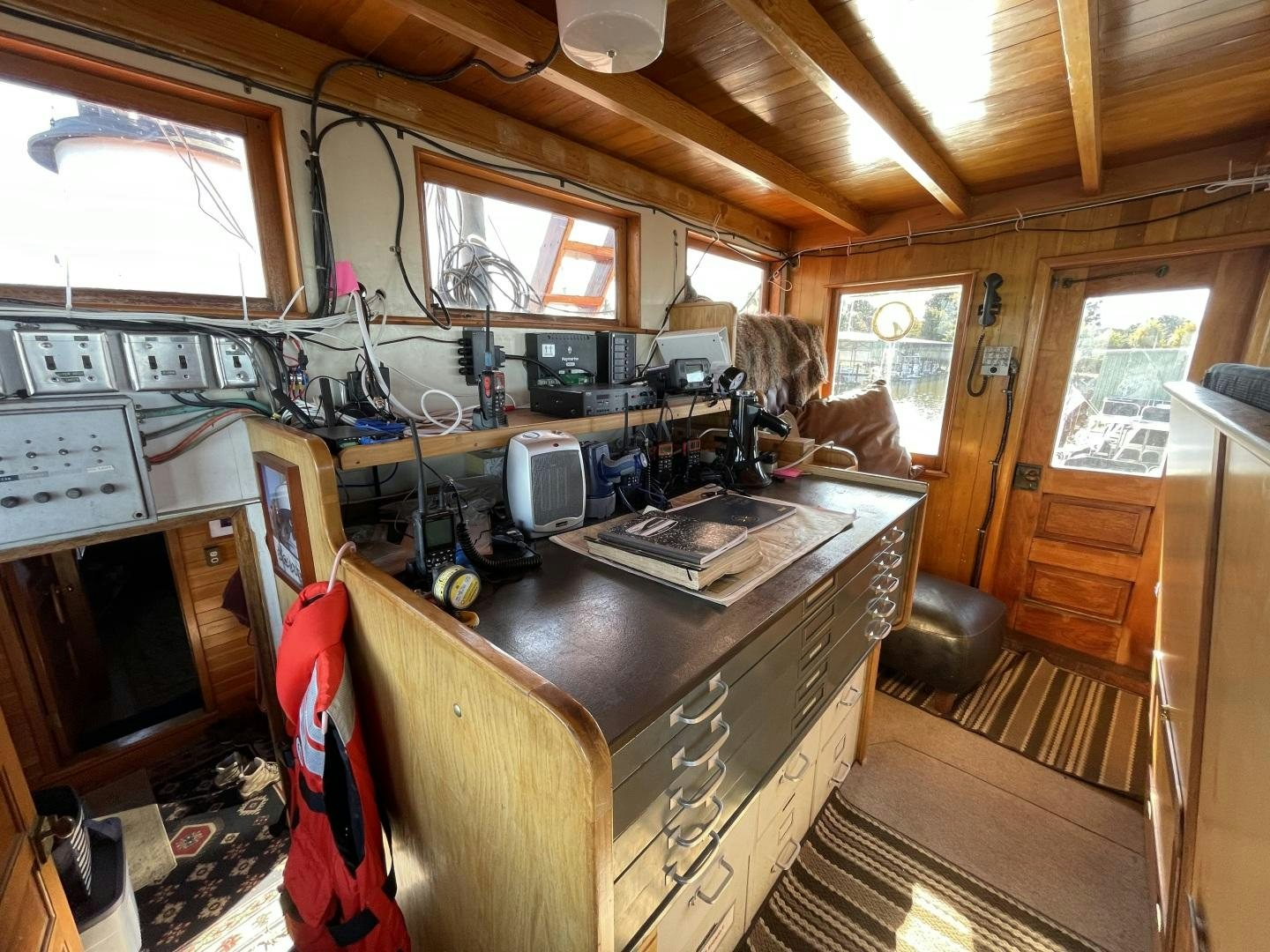a room with a desk and computer aboard SACAJAWEA Yacht for Sale