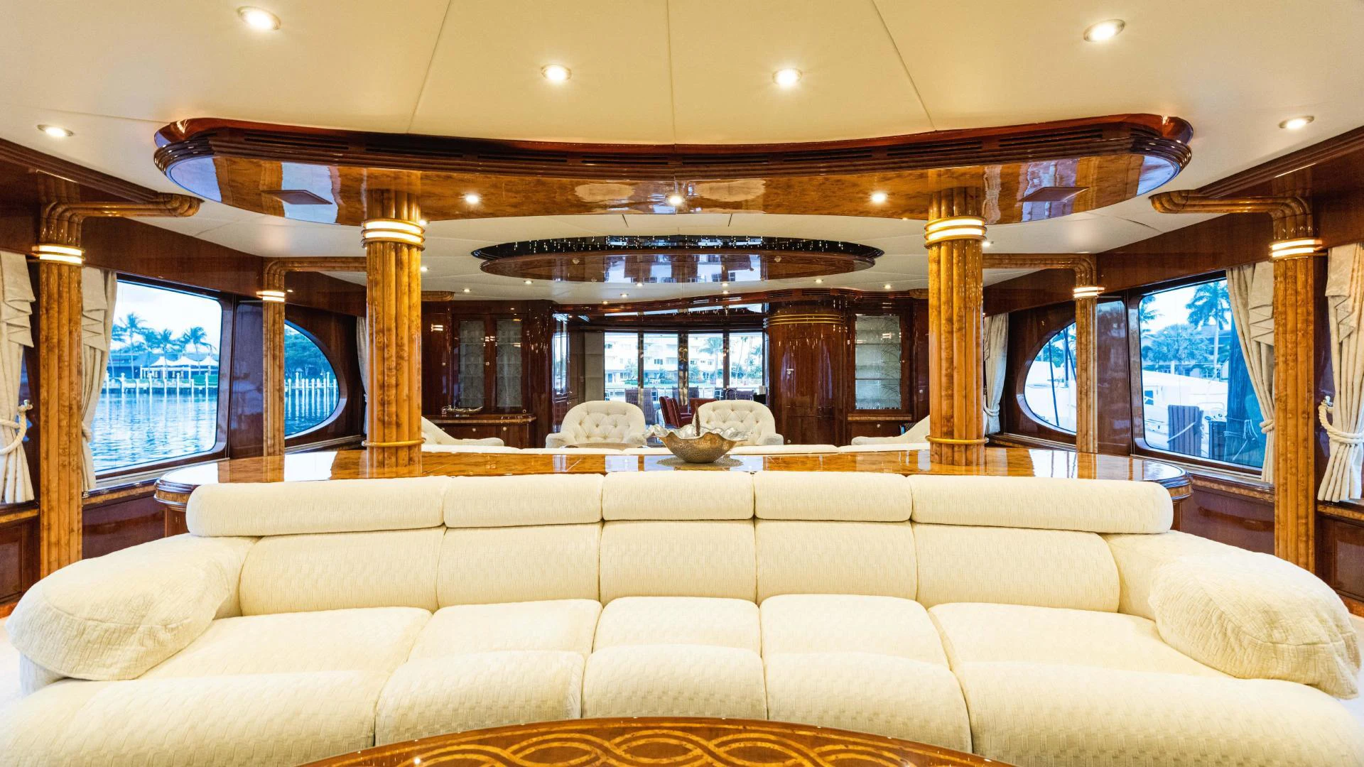 a large living room with a large window aboard ARTHUR’S WAY Yacht for Sale