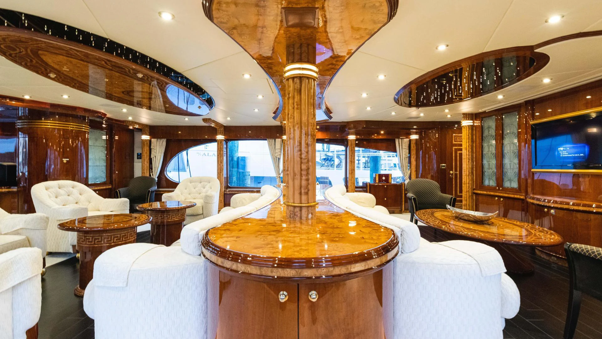 a large room with a fountain aboard ARTHUR’S WAY Yacht for Sale