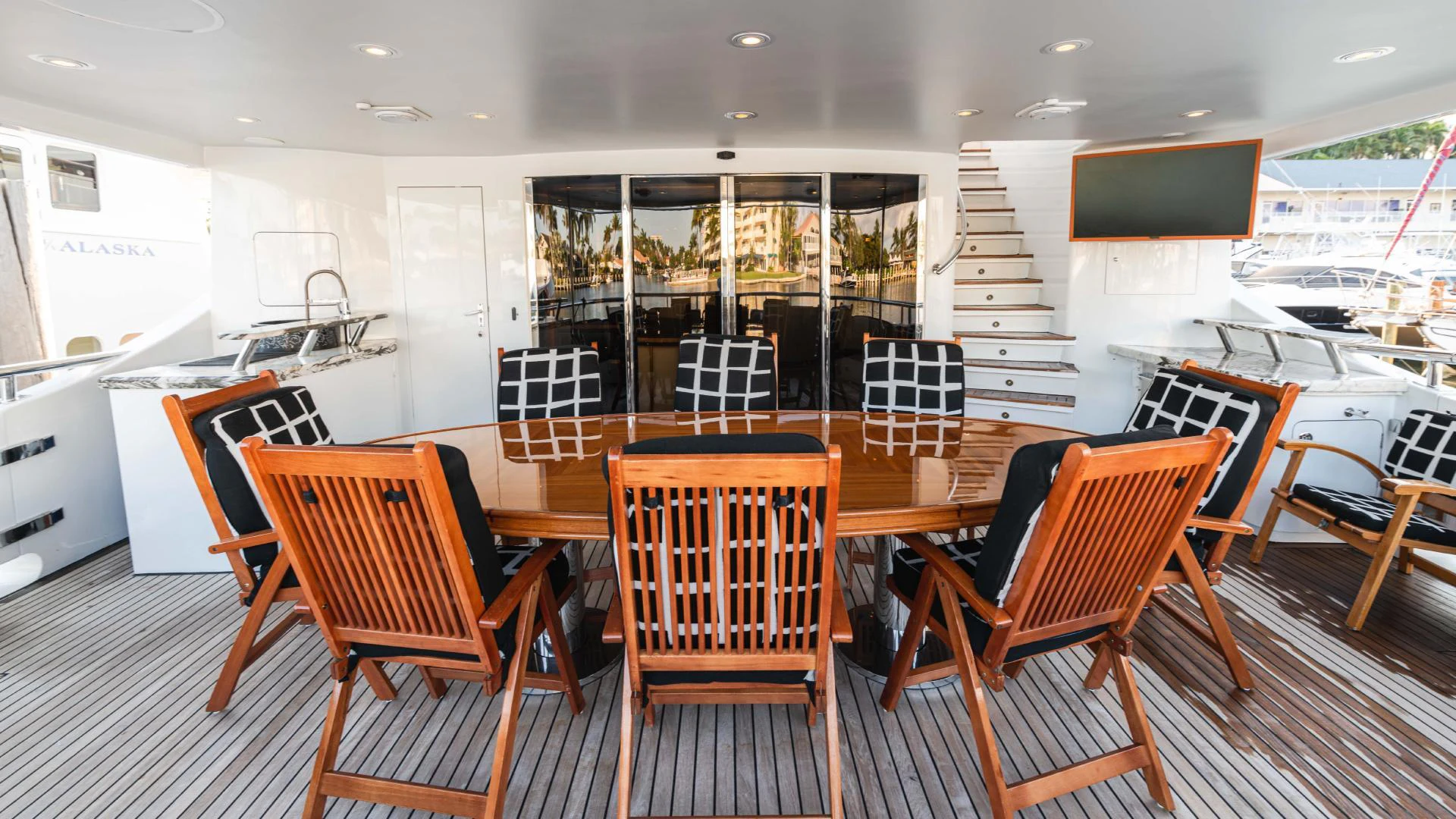 a room with chairs and a table aboard ARTHUR’S WAY Yacht for Sale
