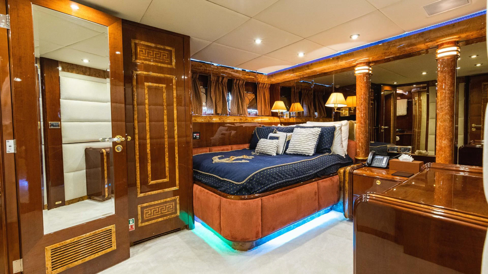 a bed in a room aboard ARTHUR’S WAY Yacht for Sale