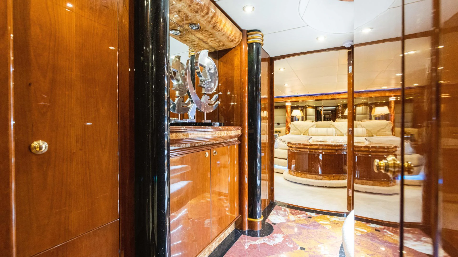 a room with a mirror and a bed aboard ARTHUR’S WAY Yacht for Sale