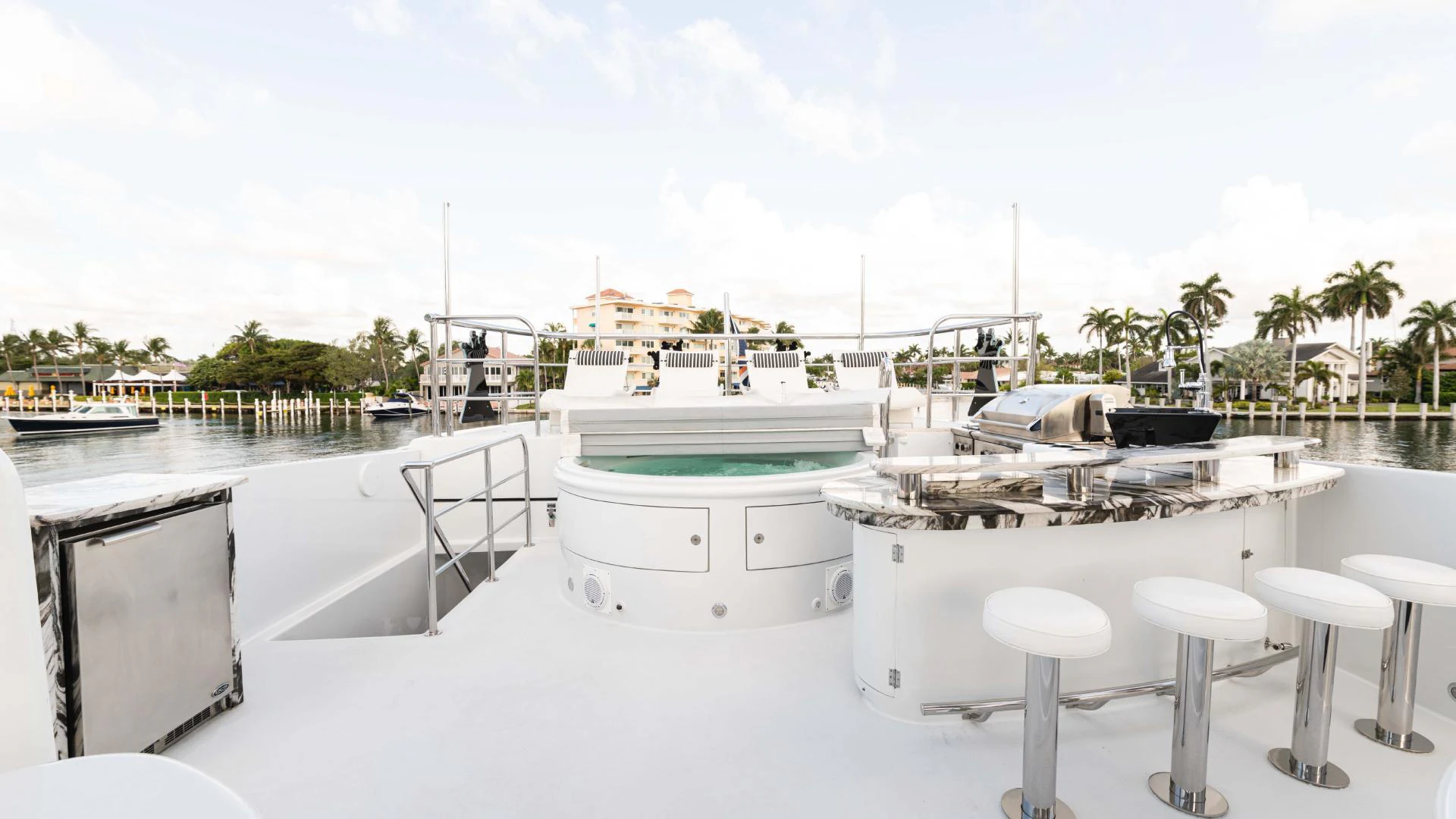 a white boat in a large body of water aboard ARTHUR’S WAY Yacht for Sale