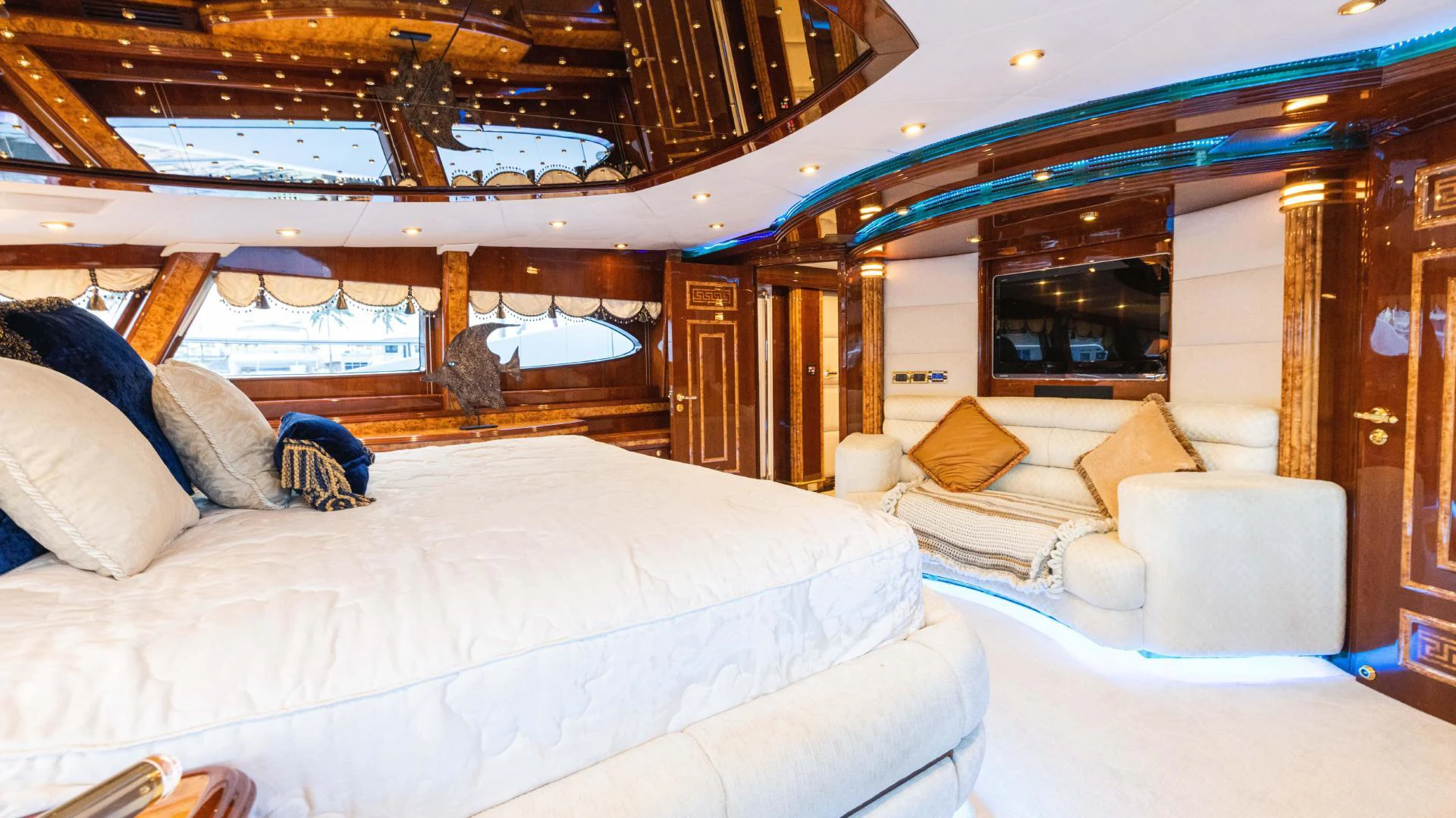 a room with a bed and a couch aboard ARTHUR’S WAY Yacht for Sale