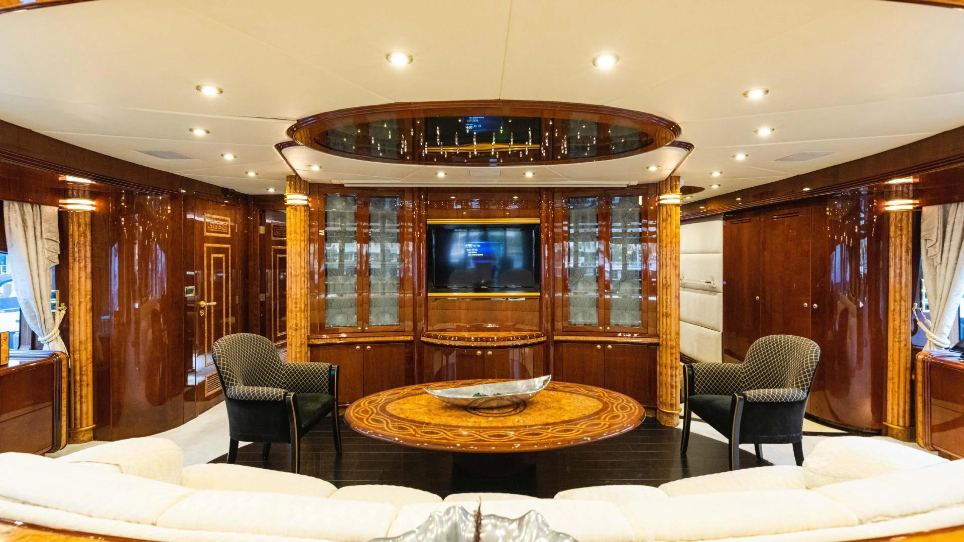 a room with a table and chairs aboard ARTHUR’S WAY Yacht for Sale