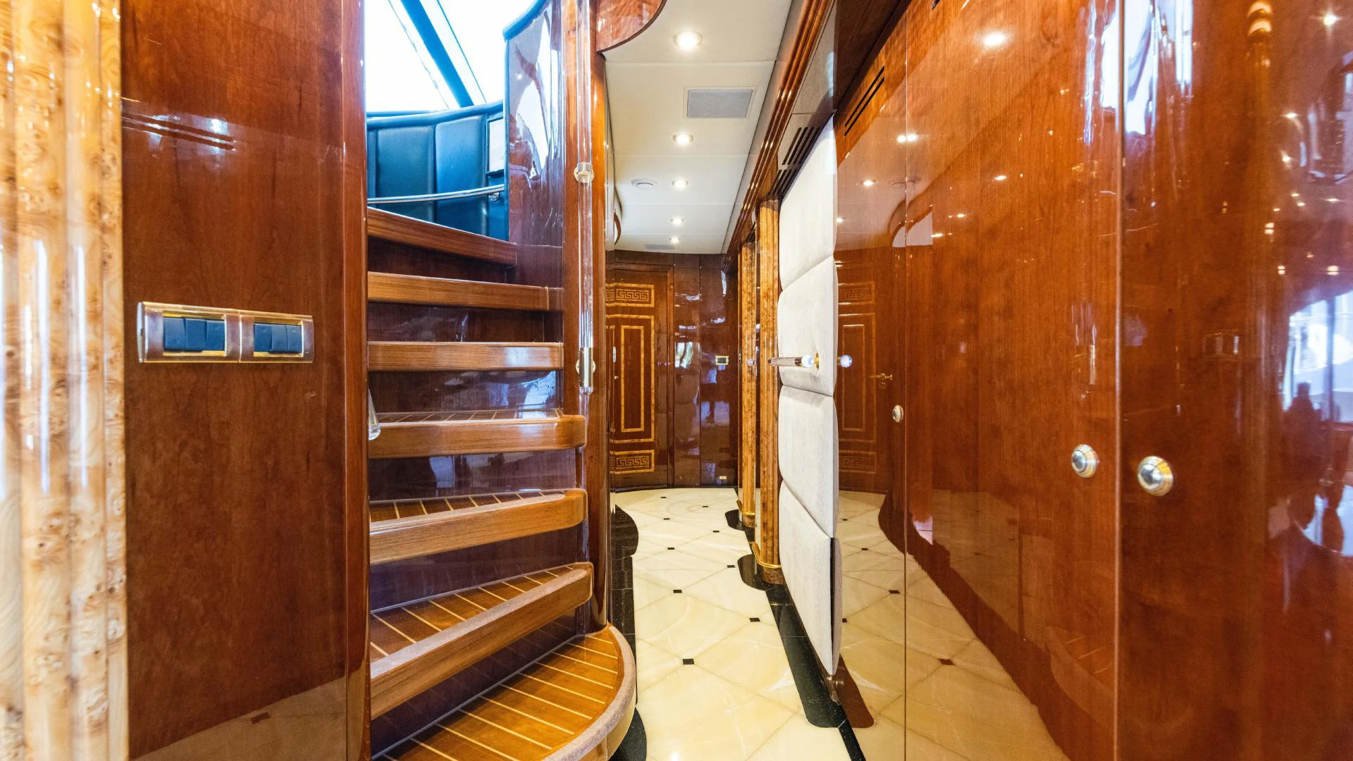 a hallway with wooden doors aboard ARTHUR’S WAY Yacht for Sale