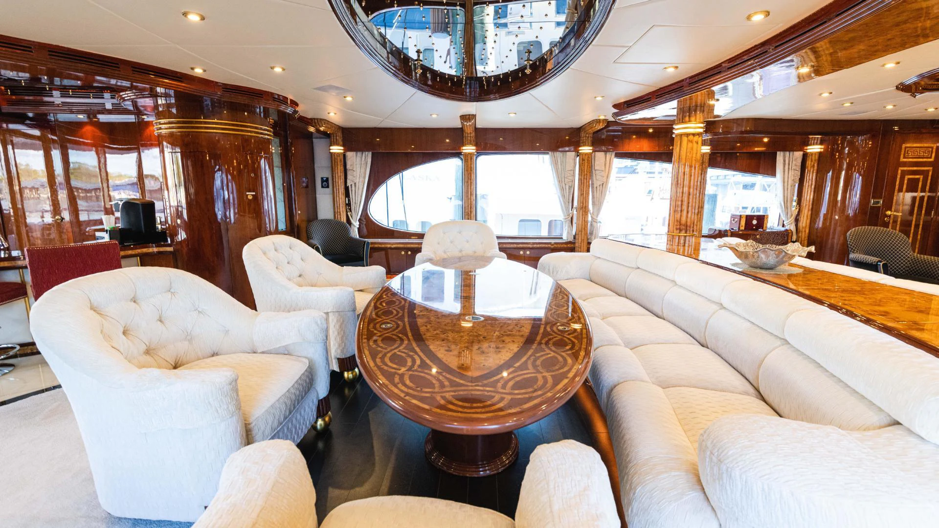 a room with a table and chairs aboard ARTHUR’S WAY Yacht for Sale