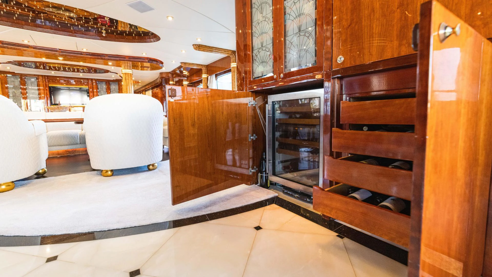 a room with a cabinet and a chair aboard ARTHUR’S WAY Yacht for Sale