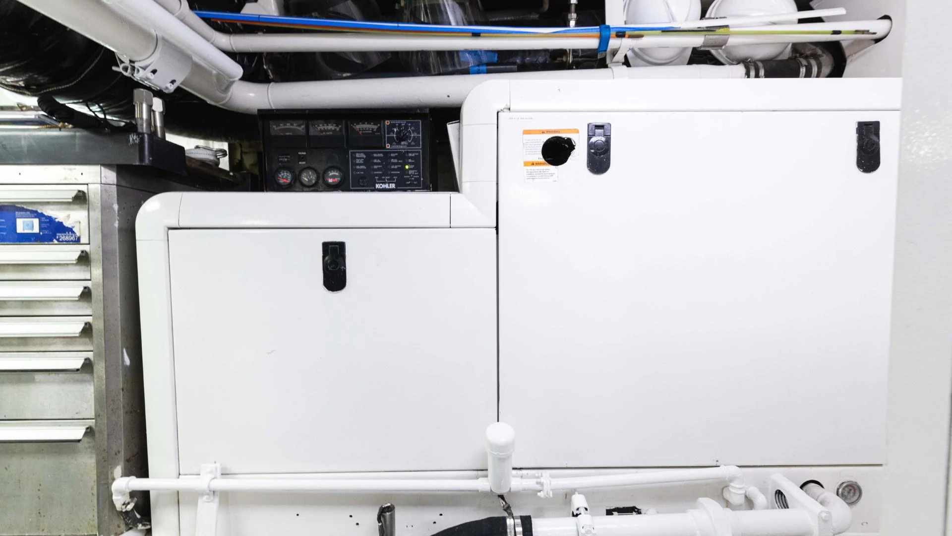 a white machine with buttons aboard ARTHUR’S WAY Yacht for Sale