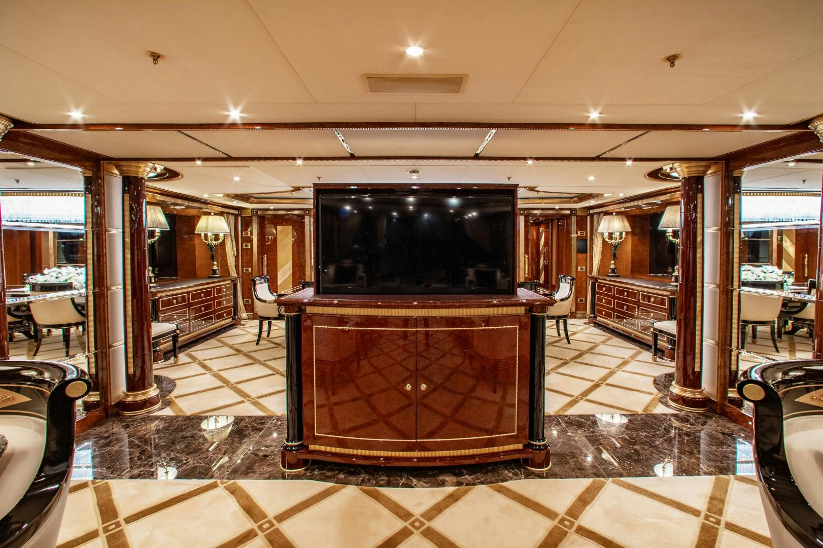 a large television in a room aboard SORRENTO Yacht for Sale
