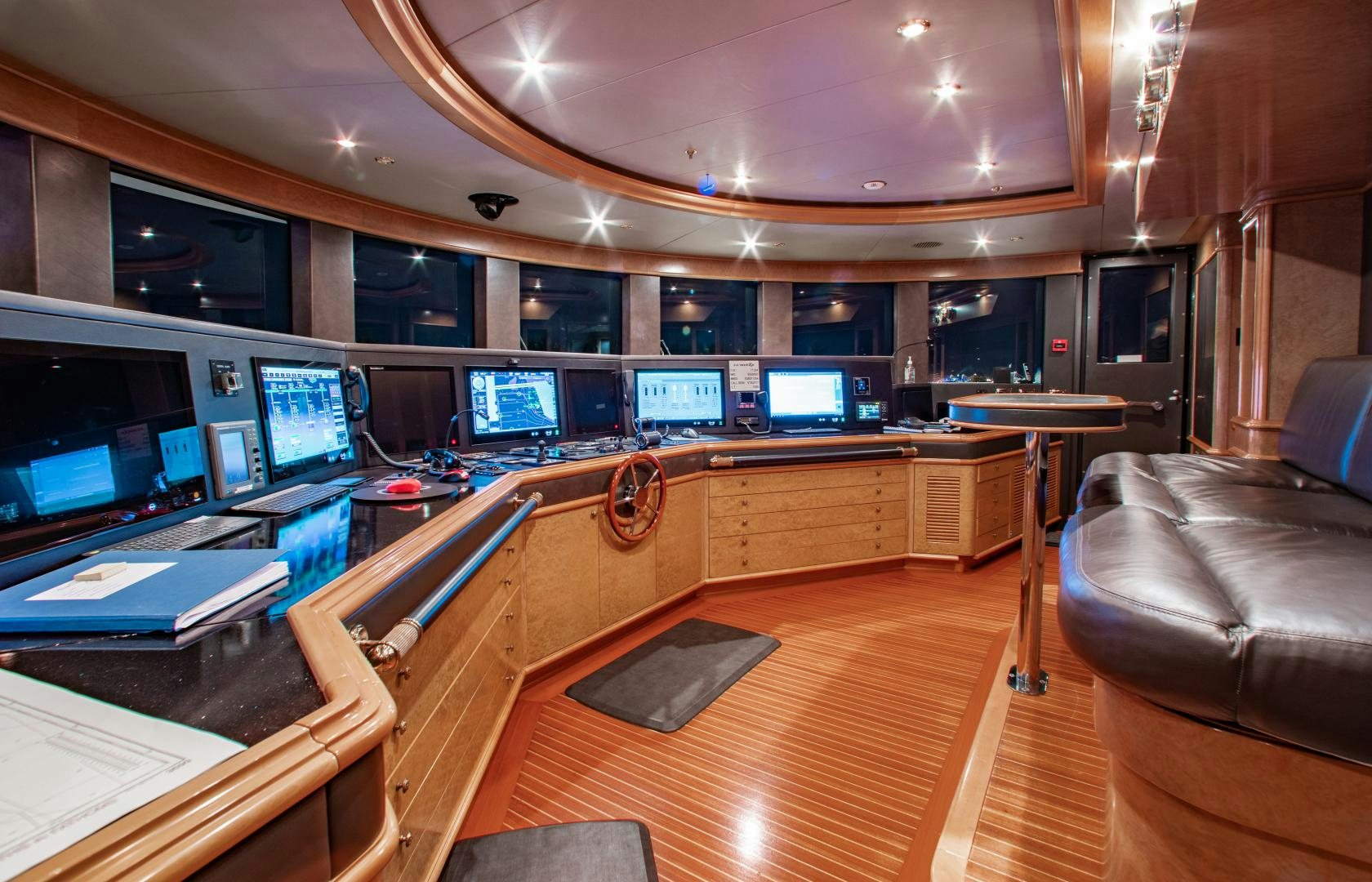 a room with a desk and chairs aboard SORRENTO Yacht for Sale