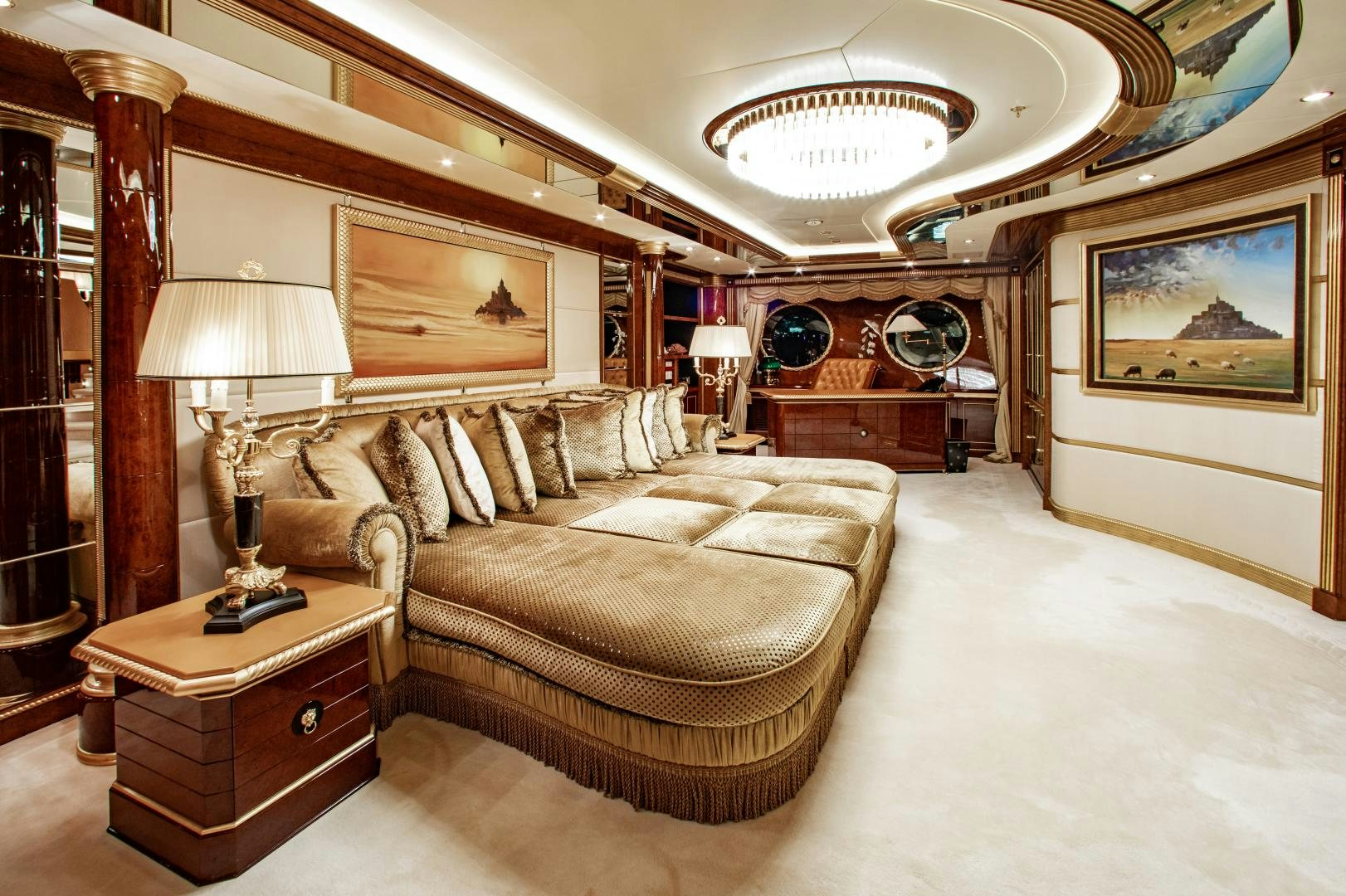 a living room with a large mirror aboard SORRENTO Yacht for Sale