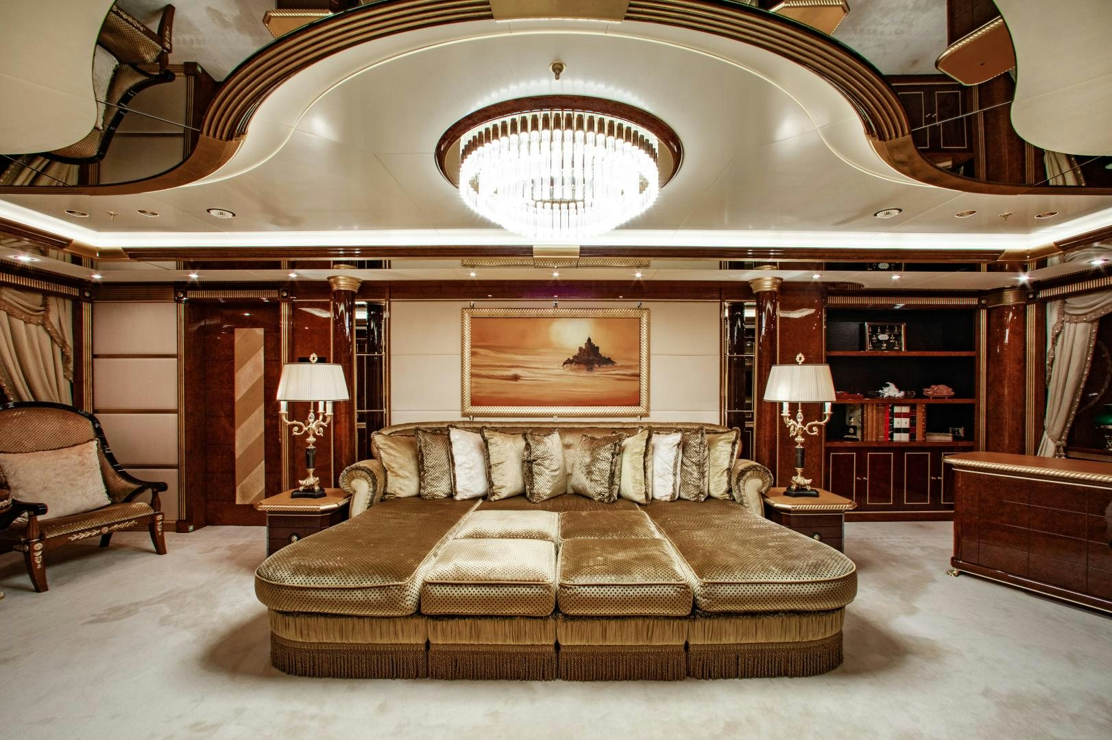 a large living room with a large chandelier aboard SORRENTO Yacht for Sale