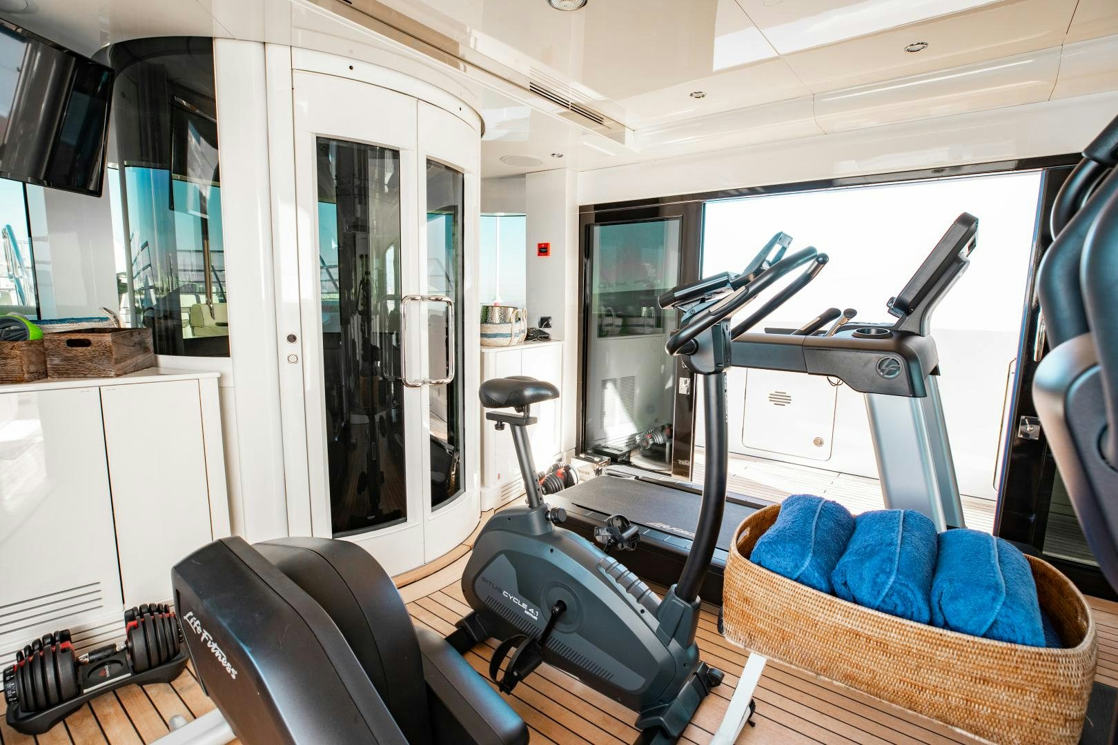 a room with exercise equipment aboard SORRENTO Yacht for Sale