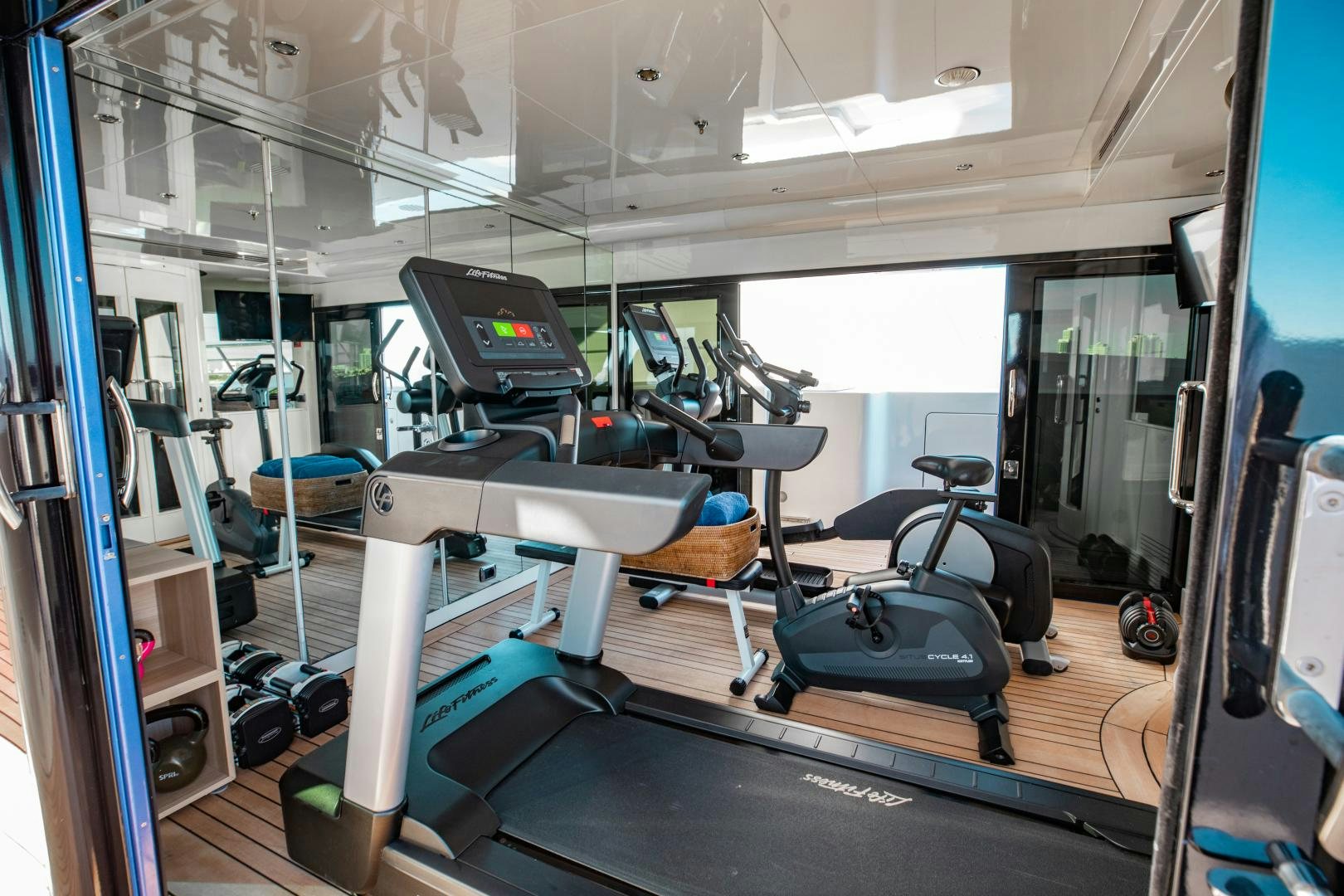 a gym with treadmills aboard SORRENTO Yacht for Sale