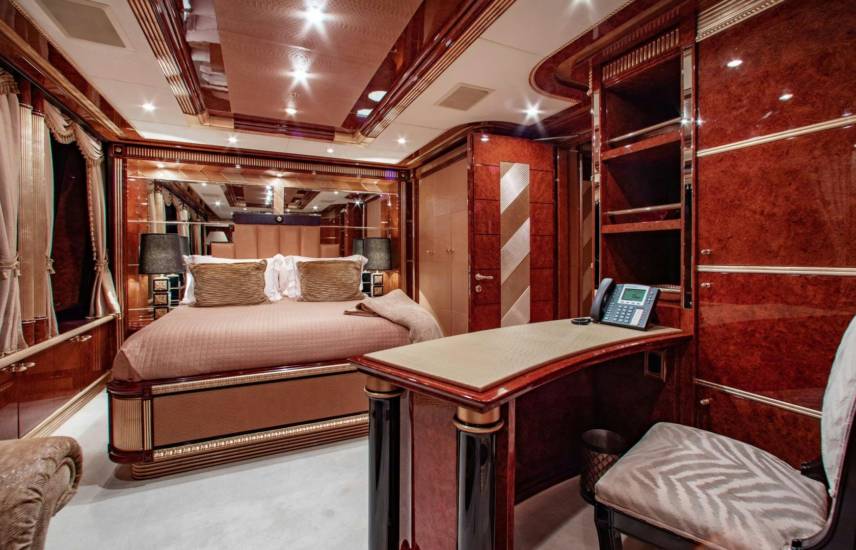 a room with a bed and a desk aboard SORRENTO Yacht for Sale