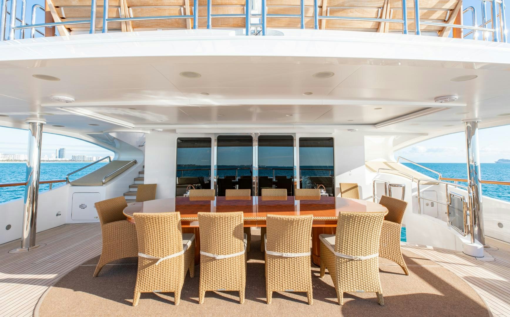a room with chairs and tables aboard SORRENTO Yacht for Sale