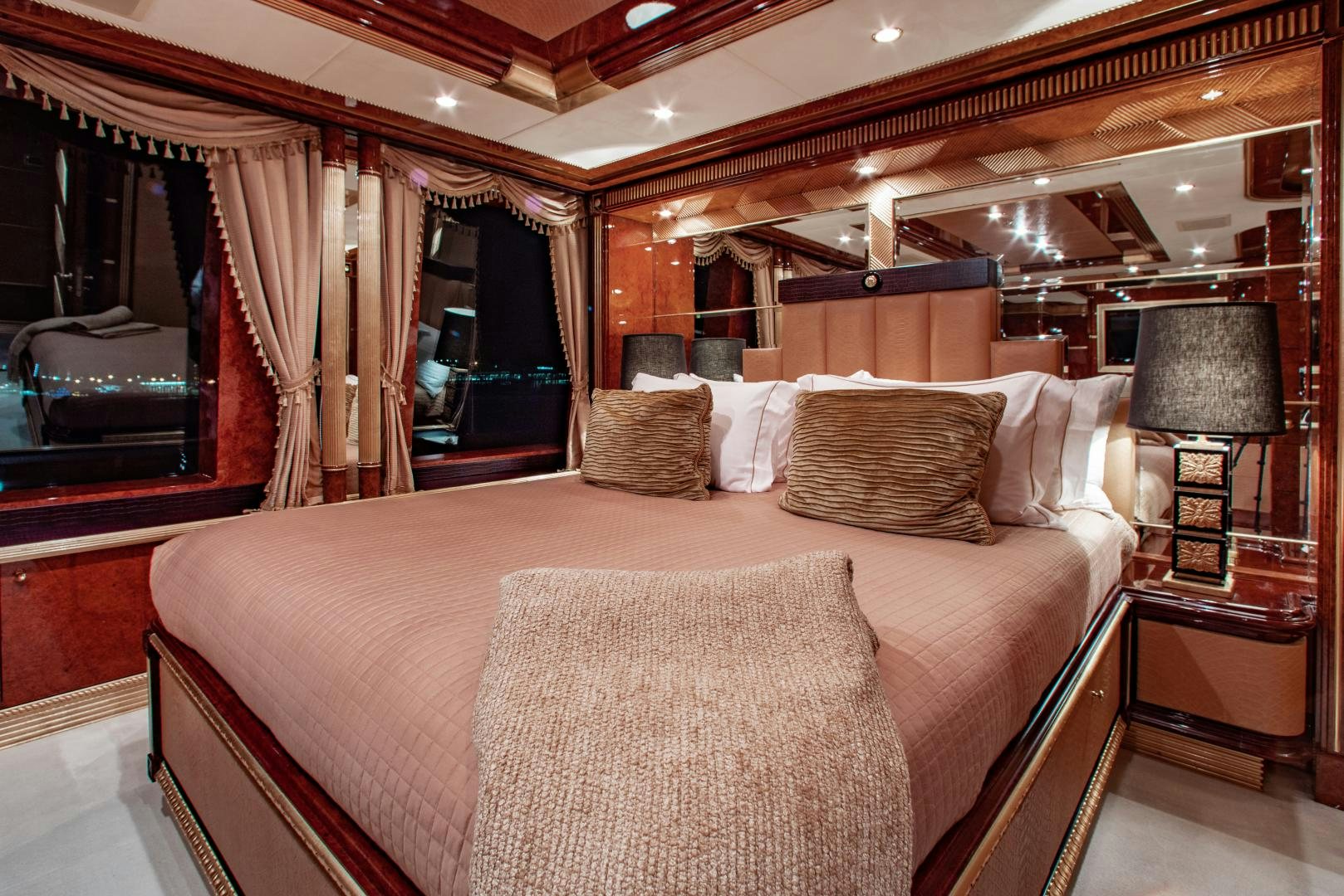 a bed with a couch aboard SORRENTO Yacht for Sale