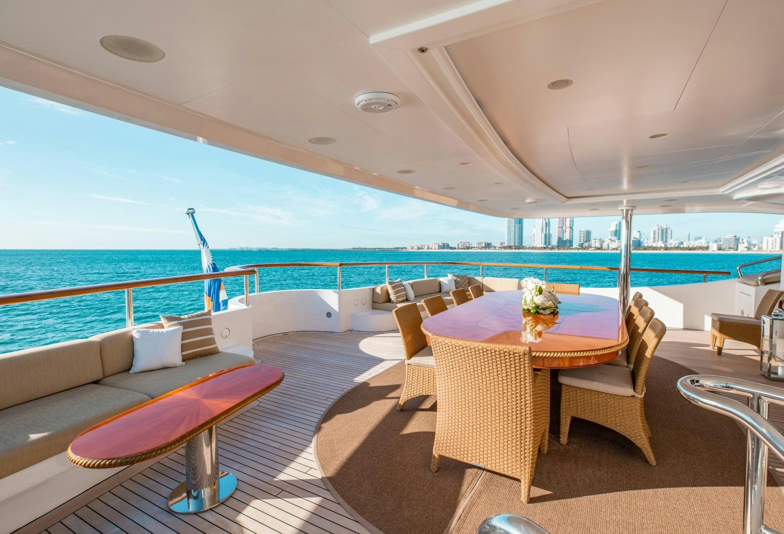 a room with a table and chairs aboard SORRENTO Yacht for Sale