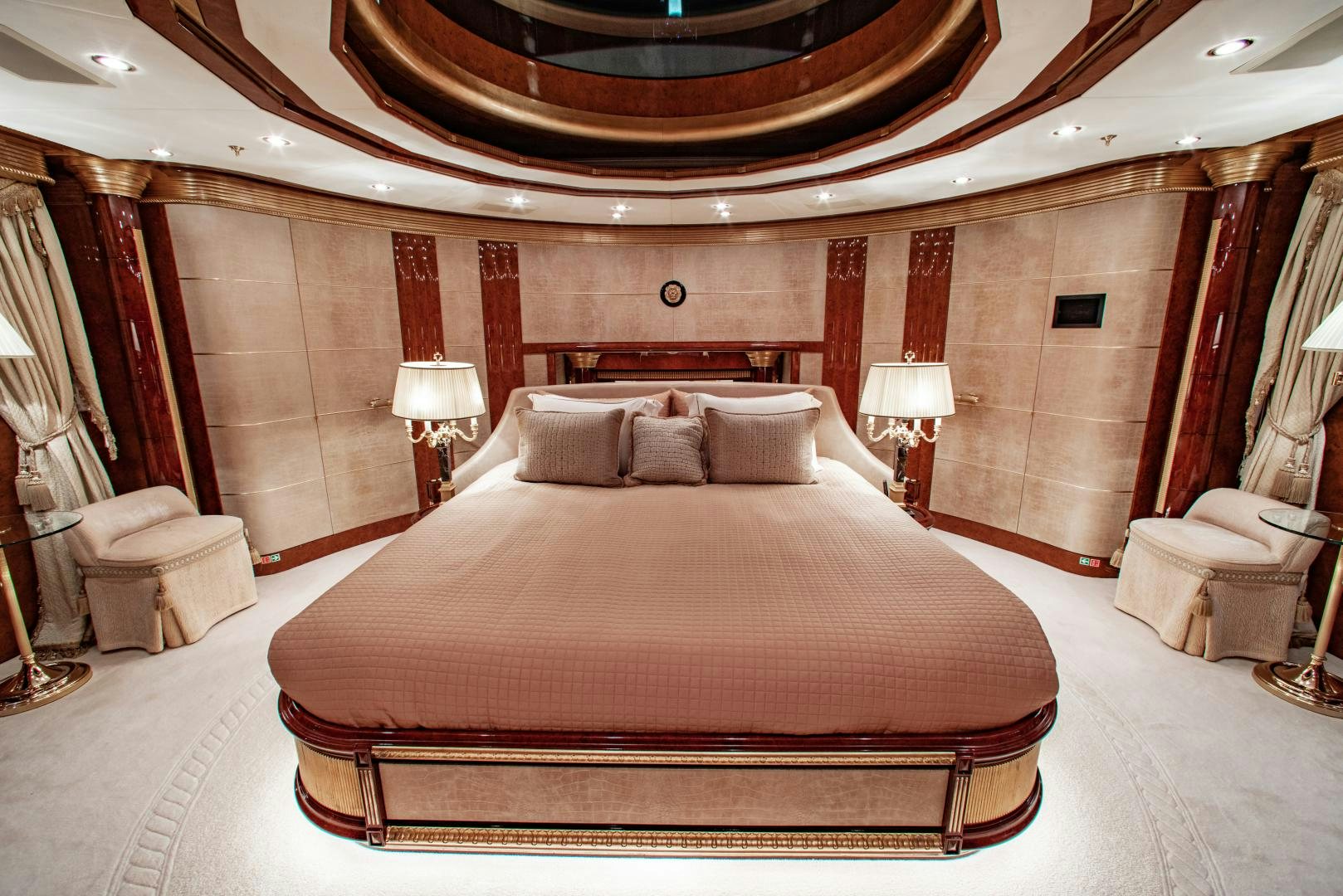 a large bed in a hotel room aboard SORRENTO Yacht for Sale