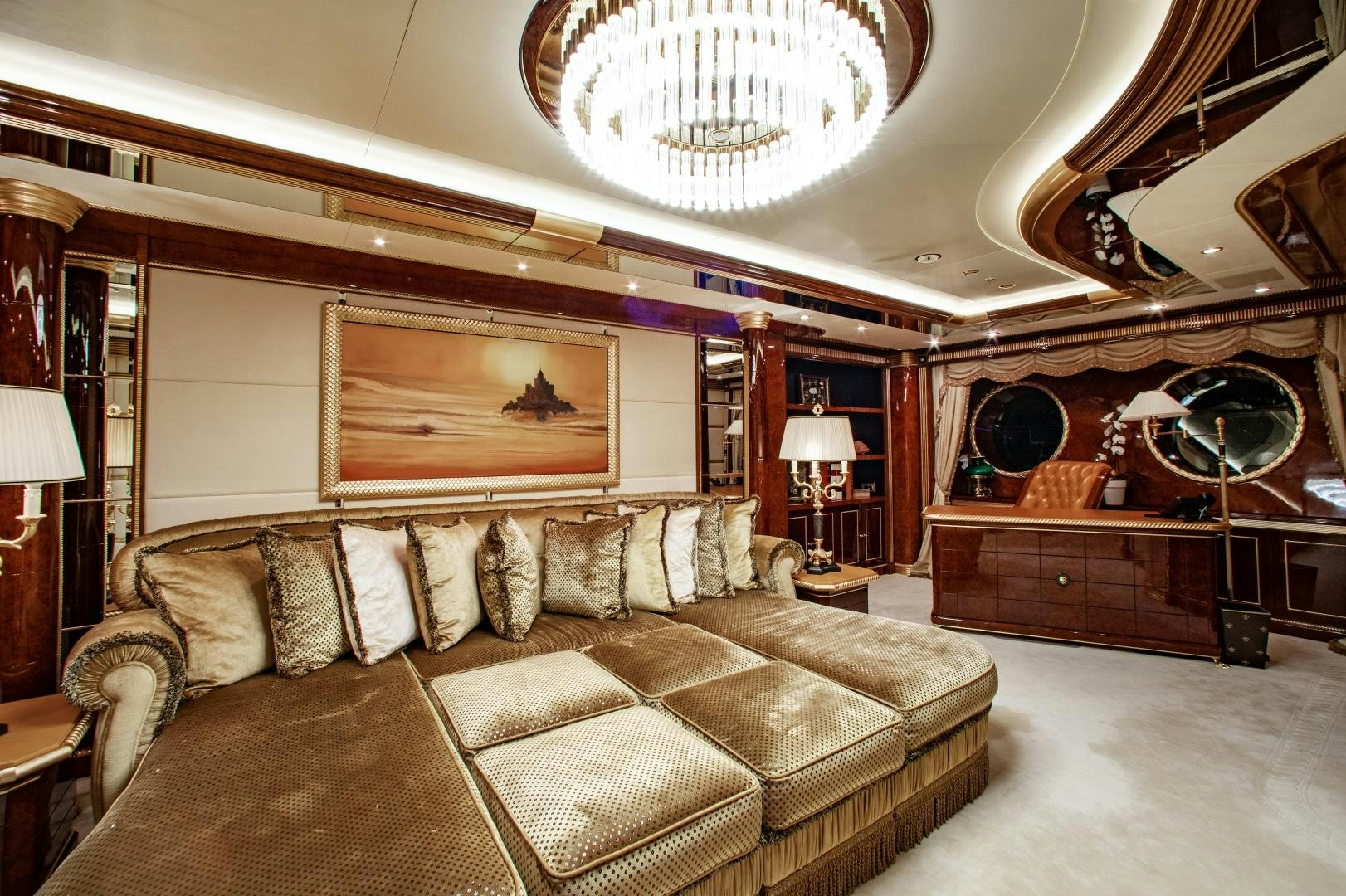 a living room with a couch and piano aboard SORRENTO Yacht for Sale