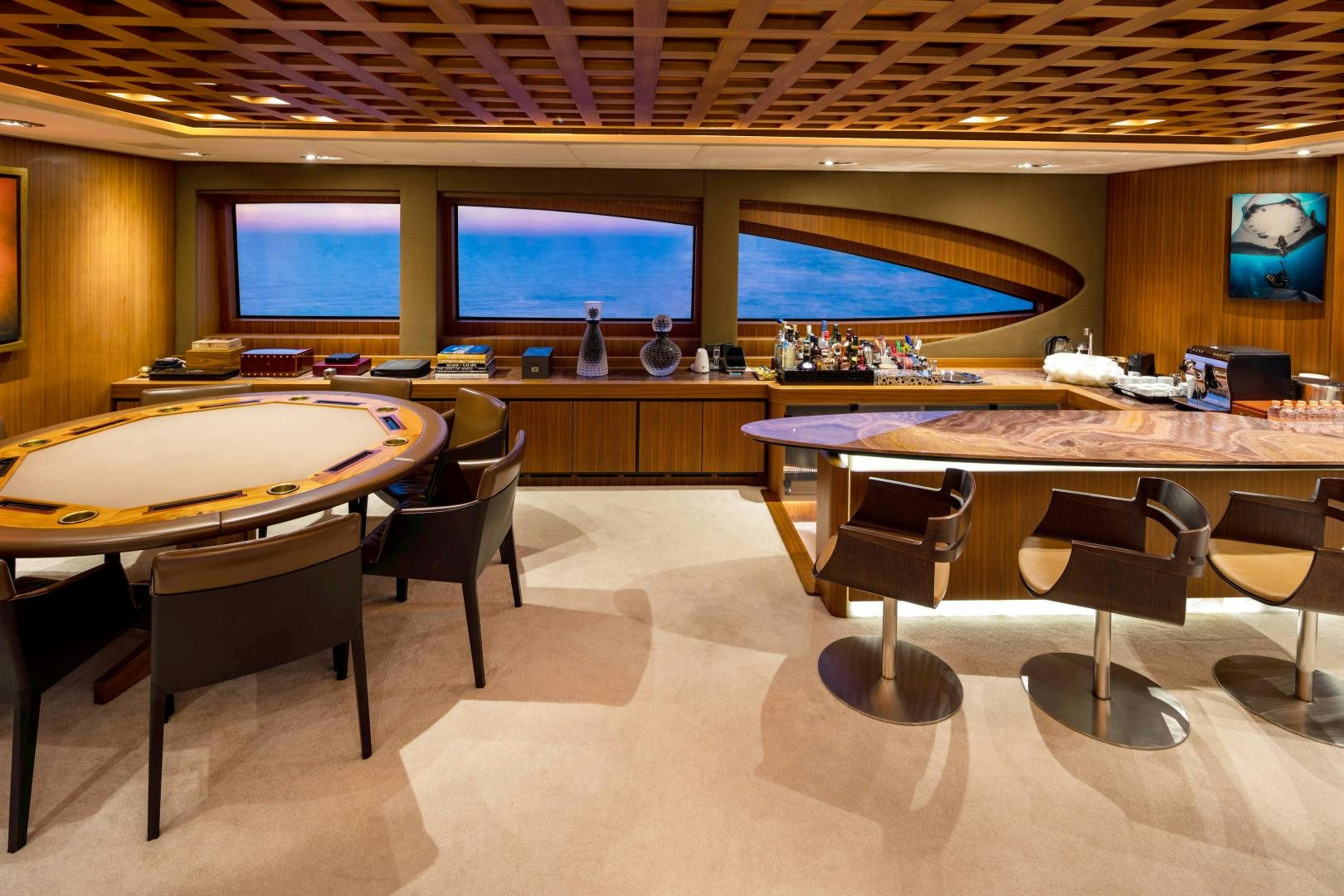 a room with tables and chairs aboard CHAMPAGNE SEAS Yacht for Sale
