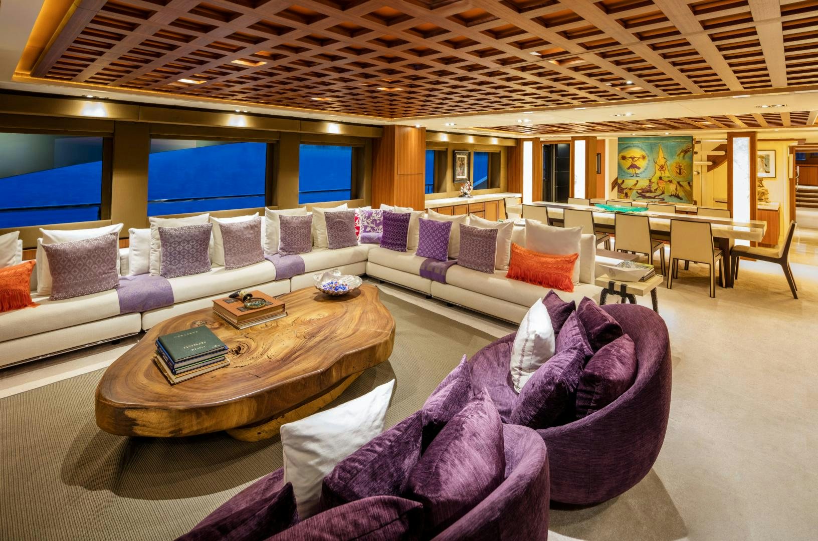 a large living room with a large screen aboard CHAMPAGNE SEAS Yacht for Sale
