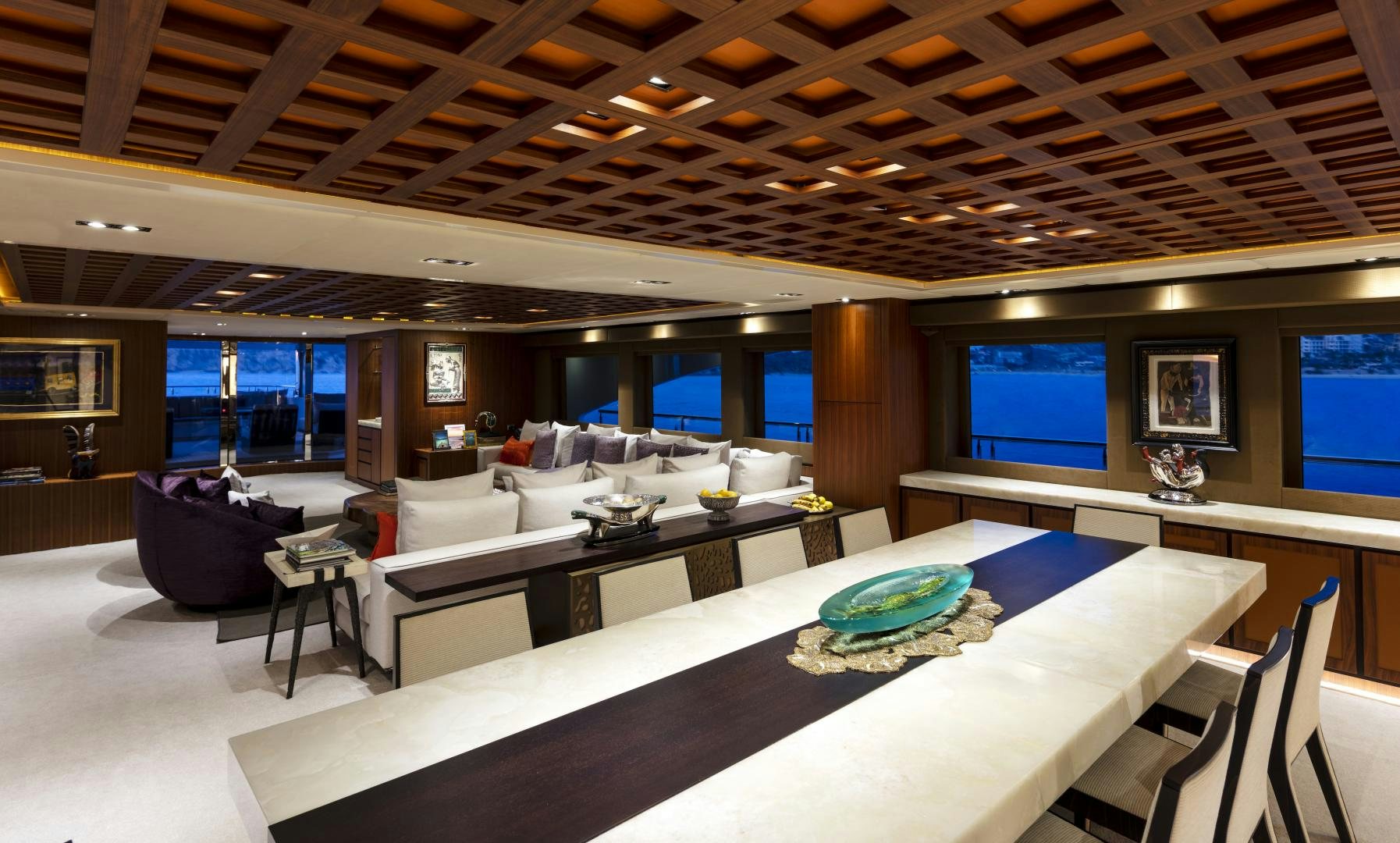 a room with tables and chairs aboard CHAMPAGNE SEAS Yacht for Charter