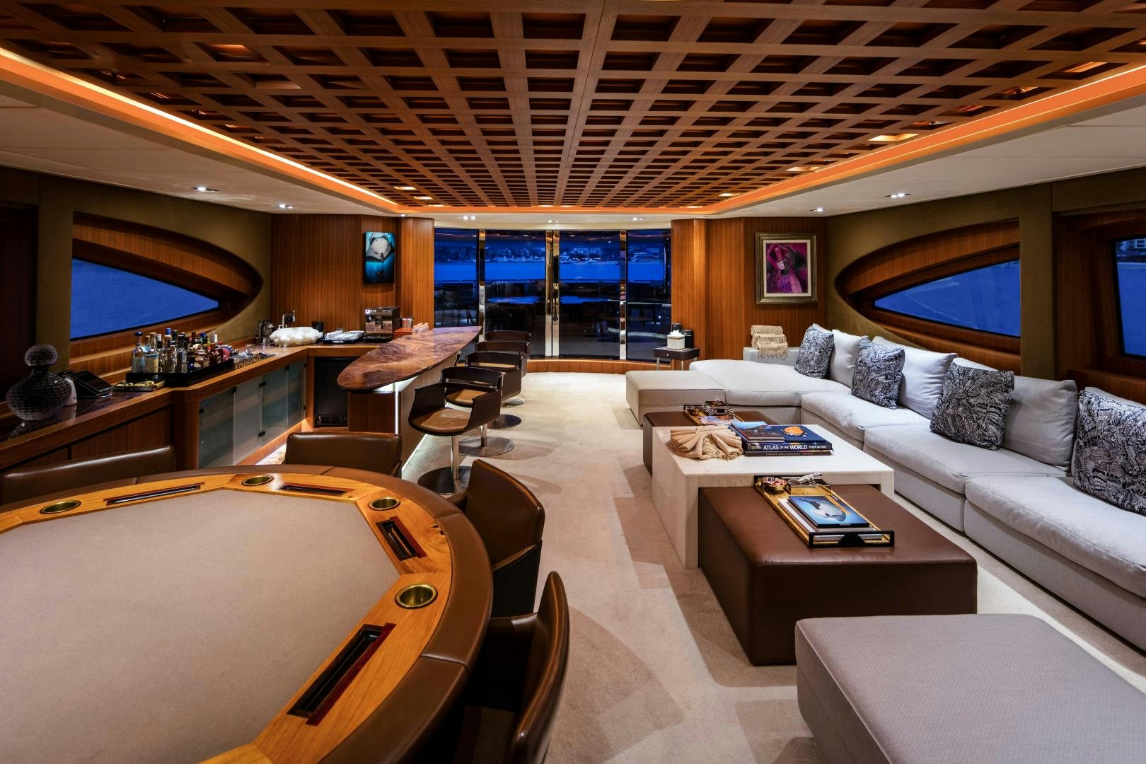 a living room with a large window aboard CHAMPAGNE SEAS Yacht for Sale