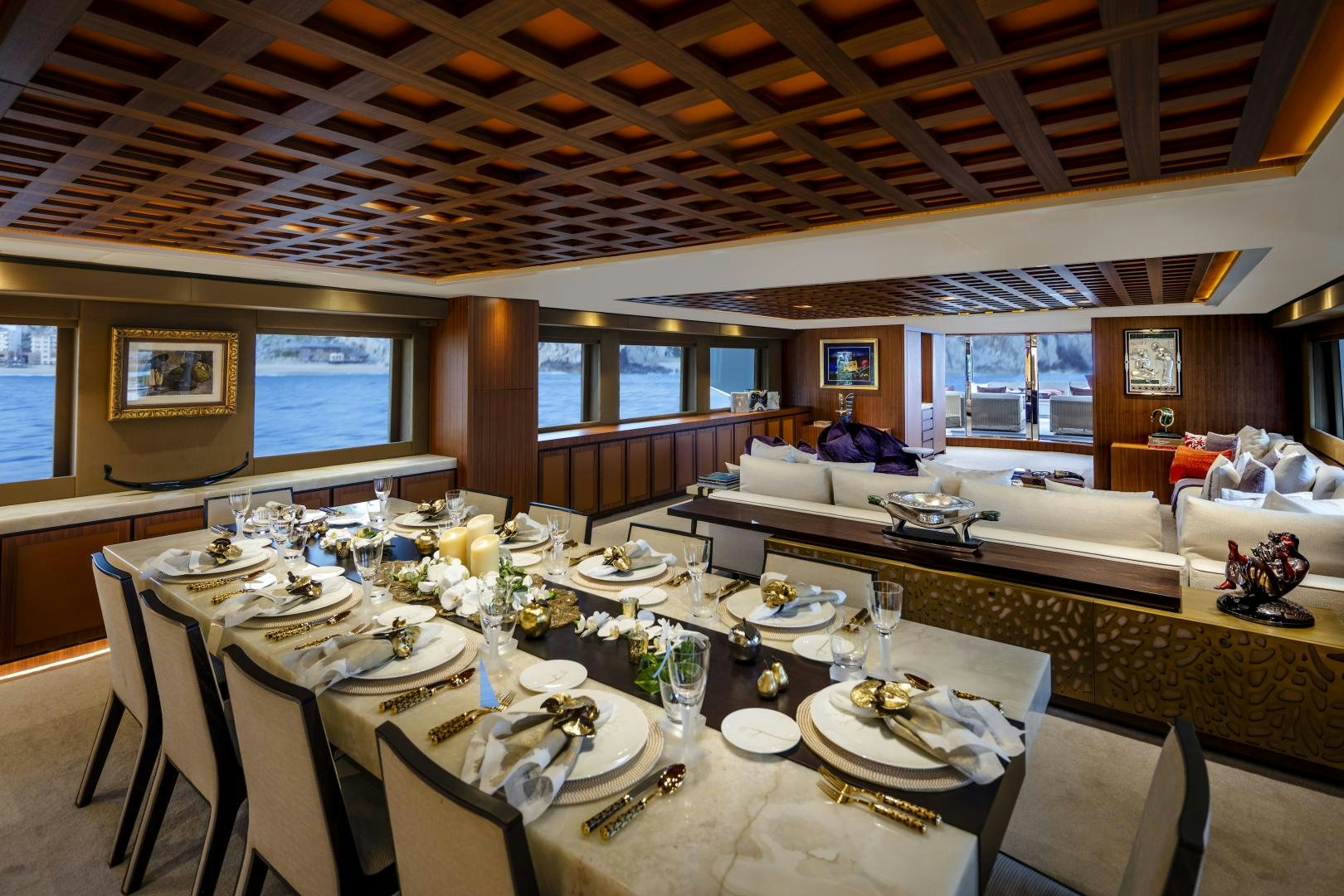 a large dining room with tables and chairs aboard CHAMPAGNE SEAS Yacht for Sale