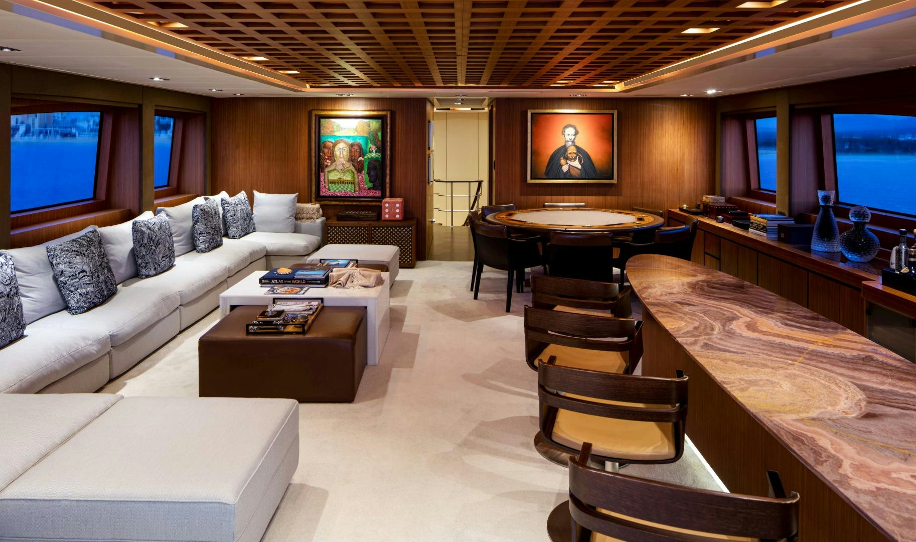 a living room with a couch and a television aboard CHAMPAGNE SEAS Yacht for Sale