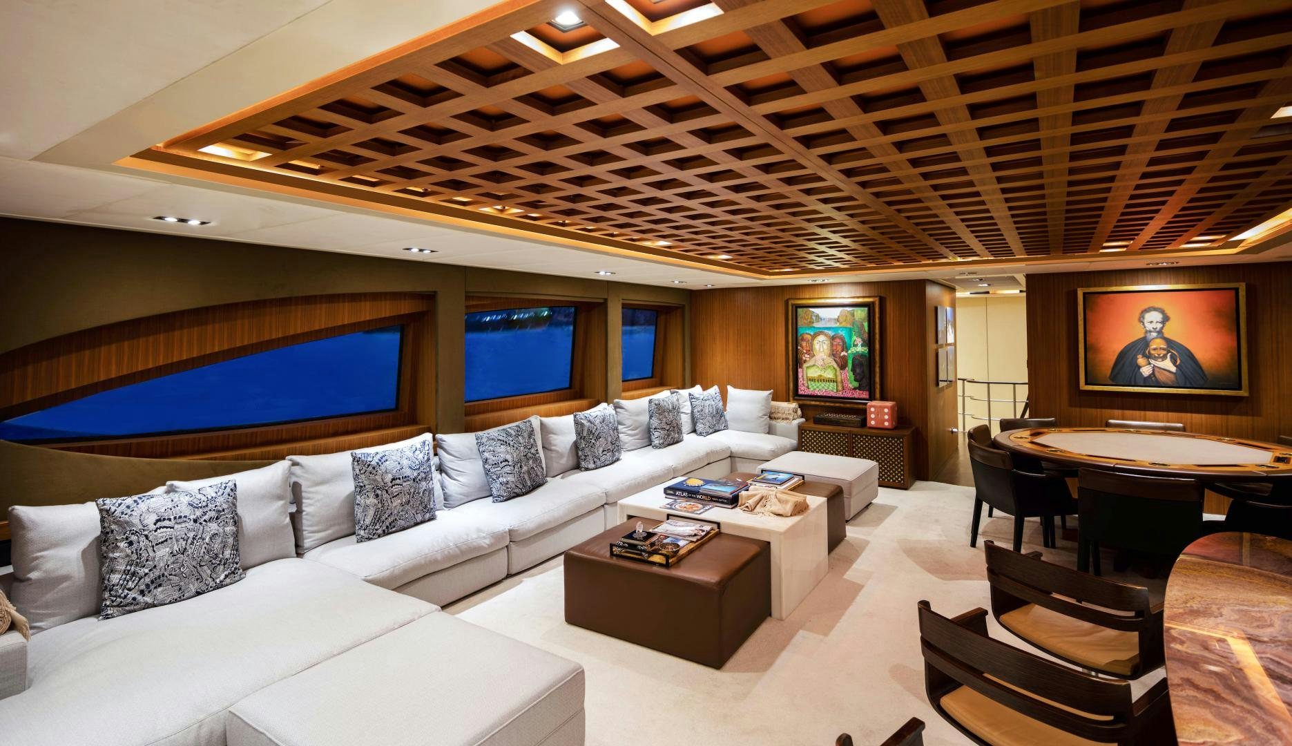 a large room with a large bed and a large screen aboard CHAMPAGNE SEAS Yacht for Charter