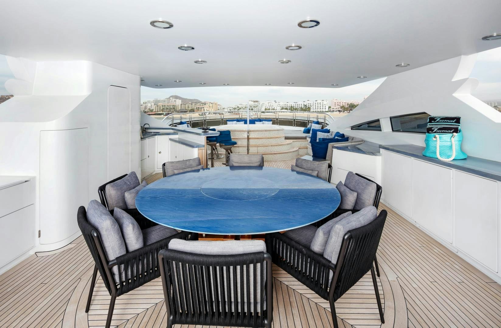a large kitchen with a table and chairs aboard CHAMPAGNE SEAS Yacht for Sale