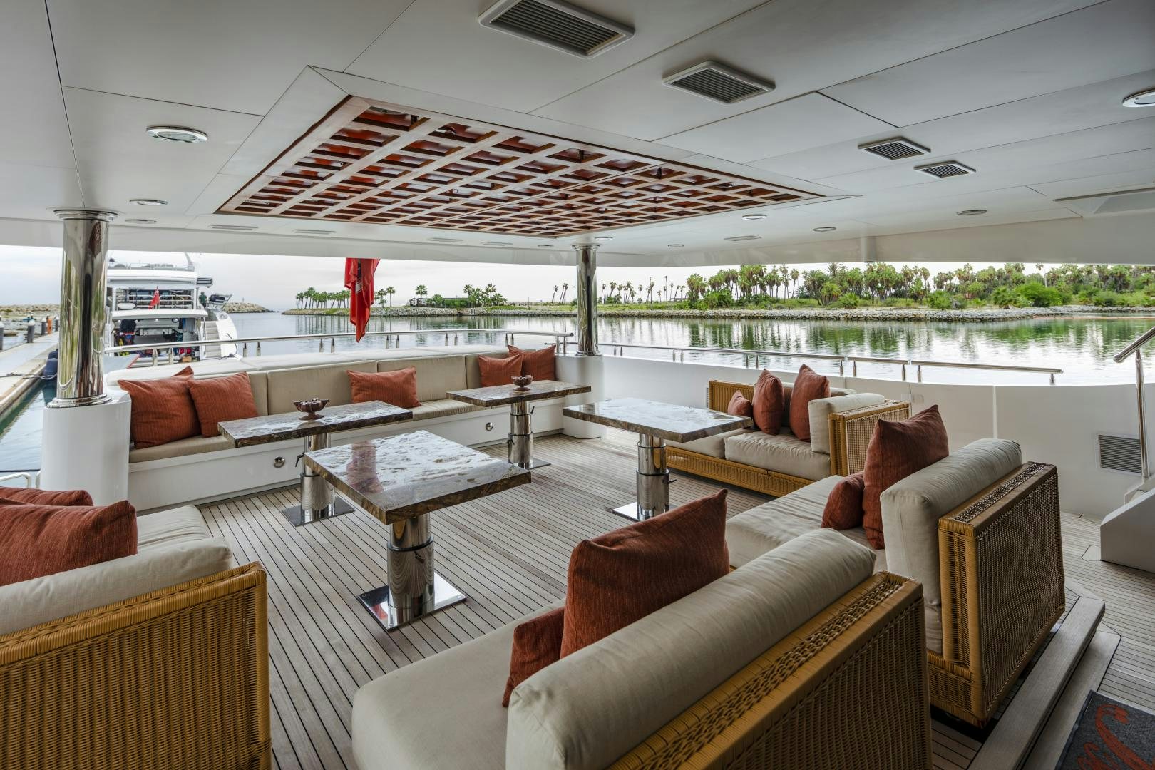 a living room with a large patio aboard CHAMPAGNE SEAS Yacht for Sale