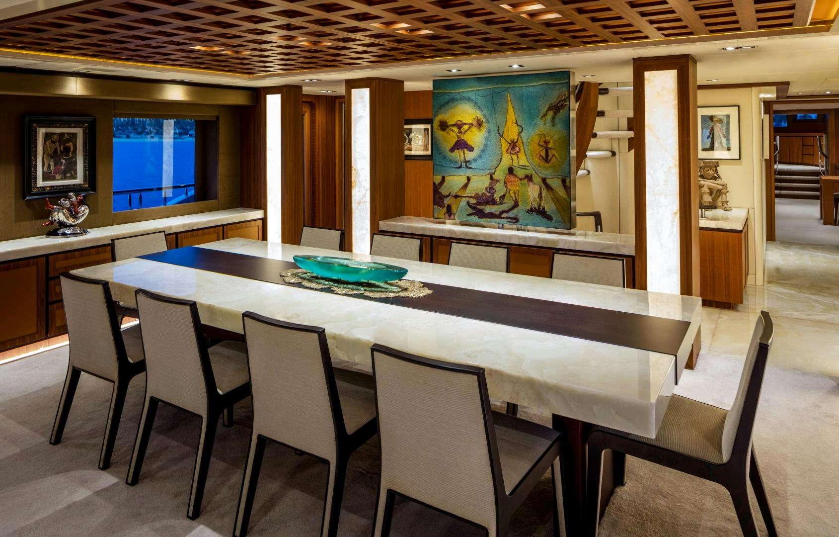a large room with a pool table and chairs aboard CHAMPAGNE SEAS Yacht for Sale