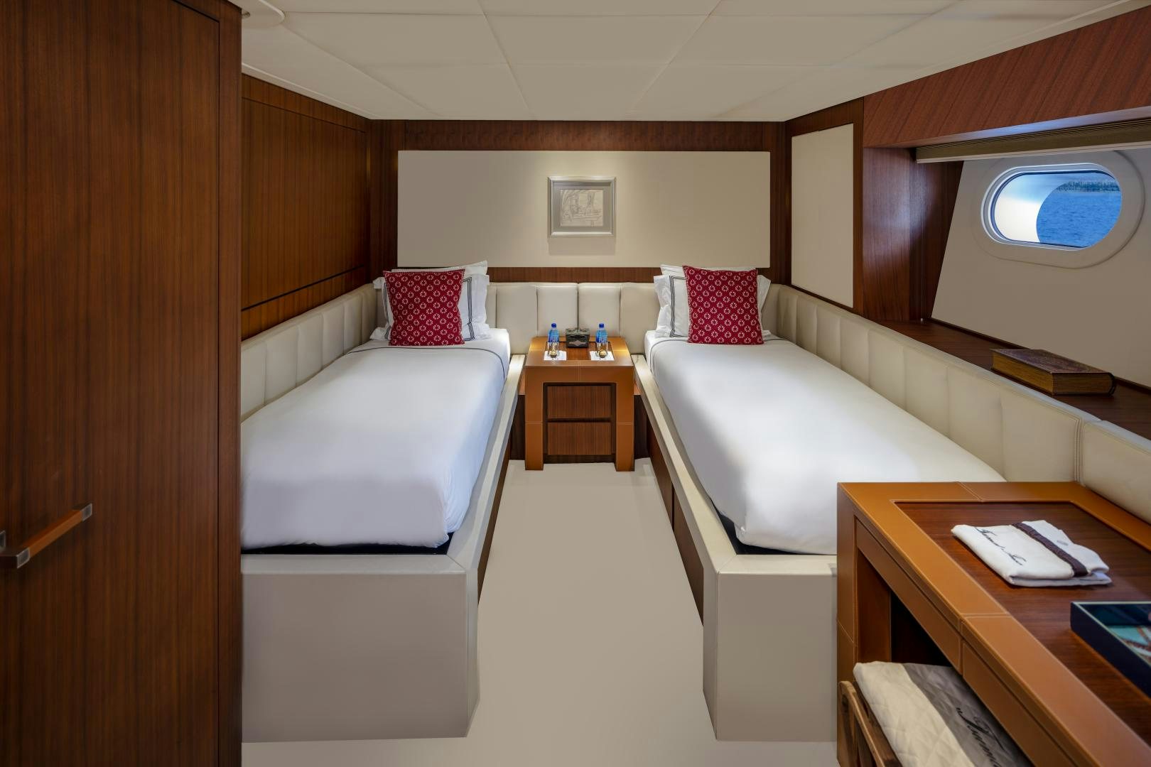 a room with two beds aboard CHAMPAGNE SEAS Yacht for Sale