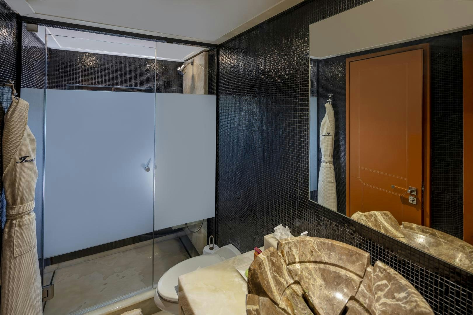 a bathroom with a large mirror aboard CHAMPAGNE SEAS Yacht for Sale