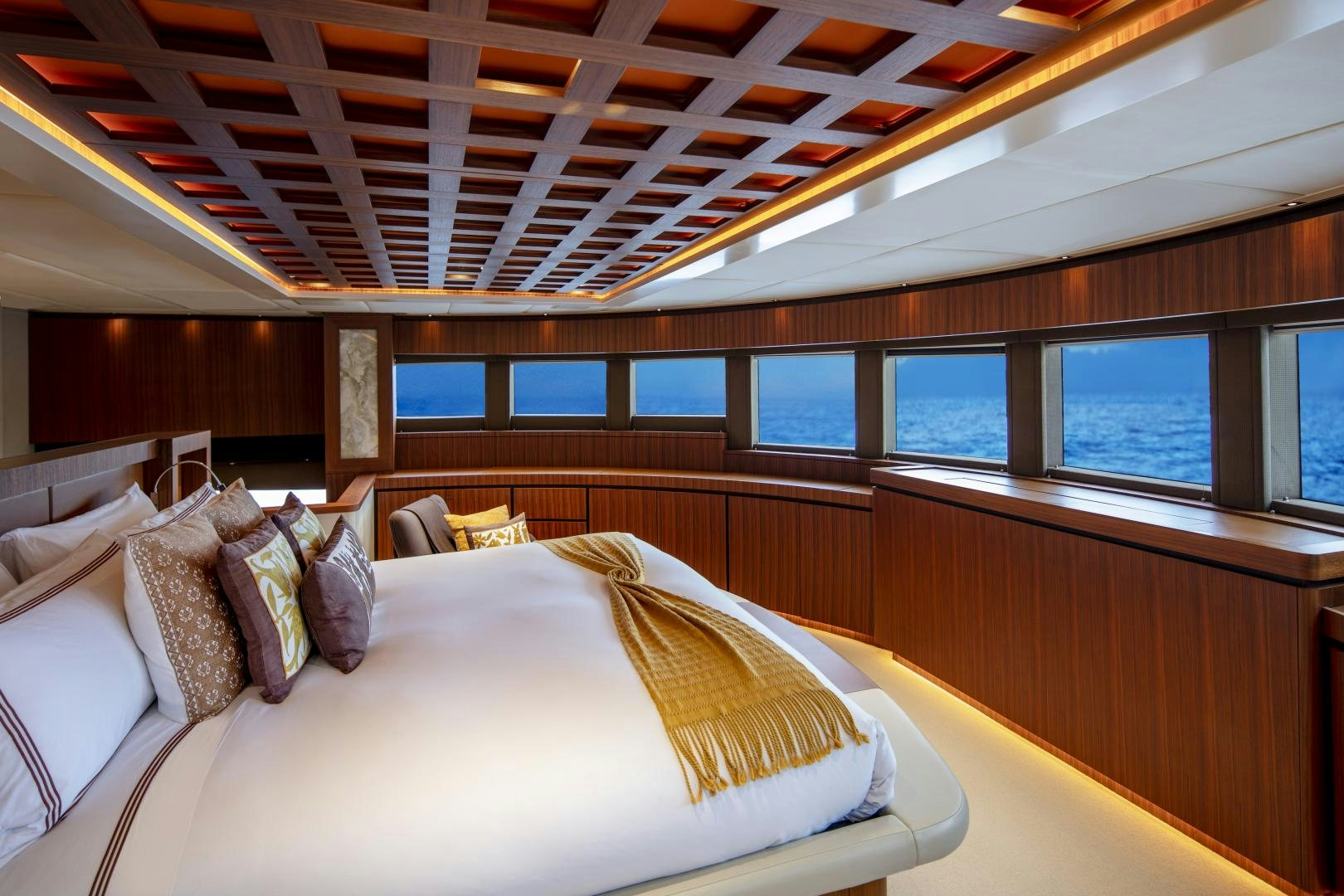 a bed in a room aboard CHAMPAGNE SEAS Yacht for Charter