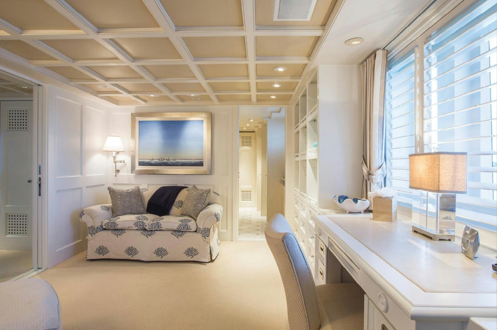 a living room with a couch and a tv aboard RHINO Yacht for Sale