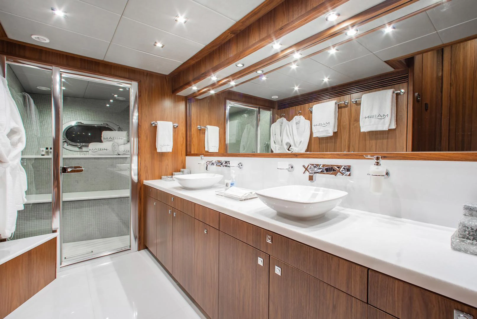 a bathroom with a large mirror aboard MARIN Yacht for Sale