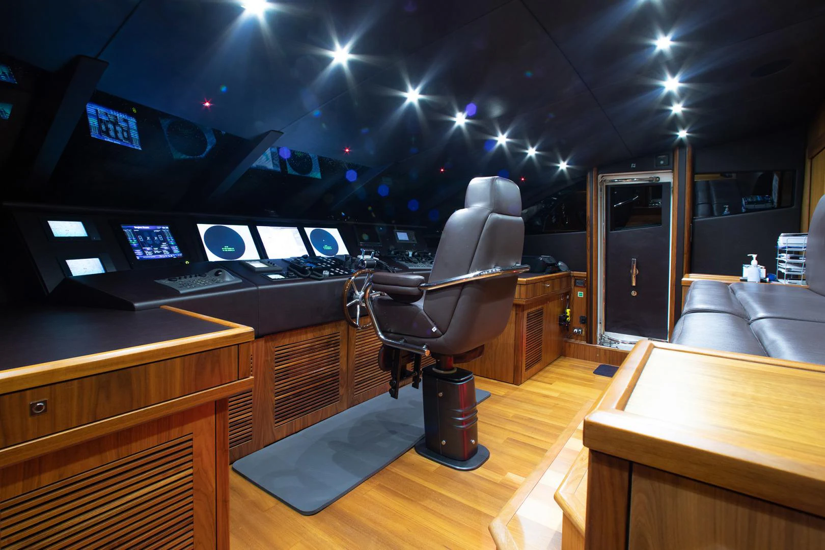 a room with a desk and chairs aboard MARIN Yacht for Sale