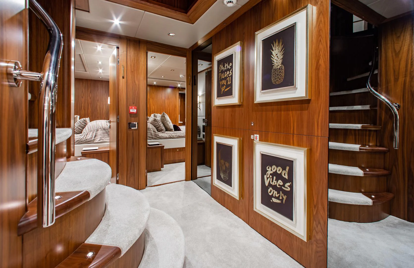 a room with a bed and a staircase aboard MARIN Yacht for Sale