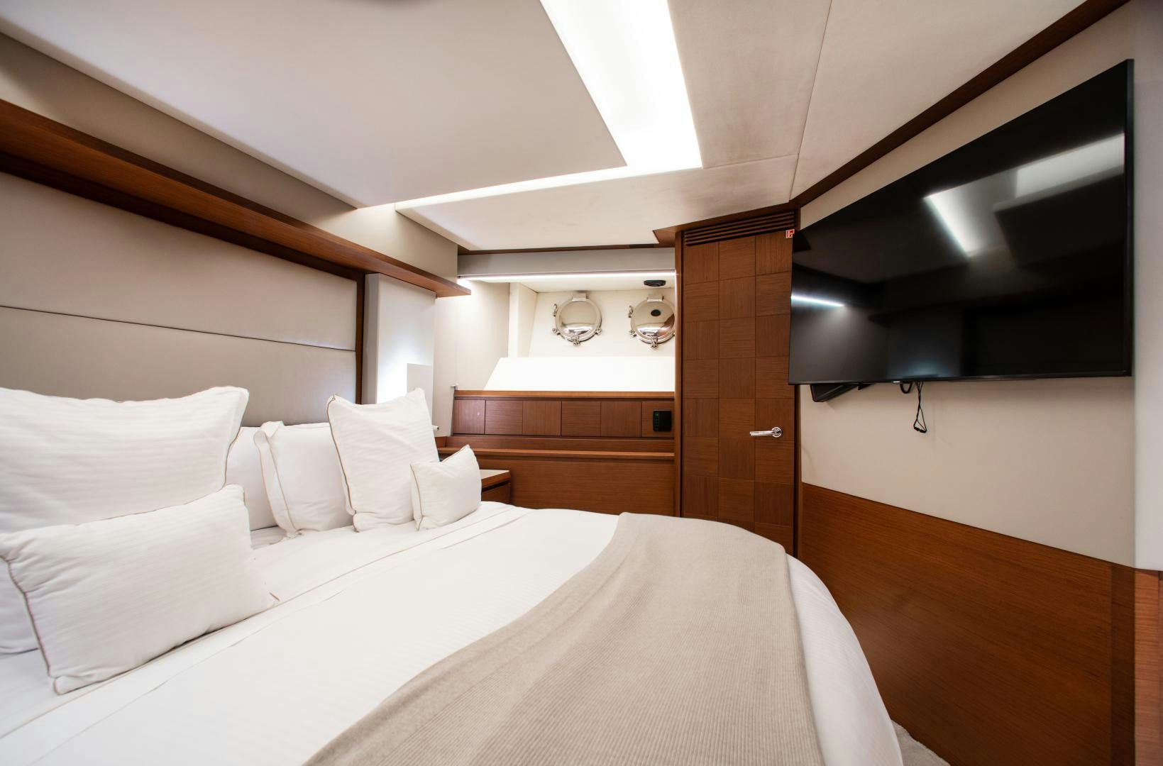 a room with two beds aboard ARREEE! Yacht for Sale